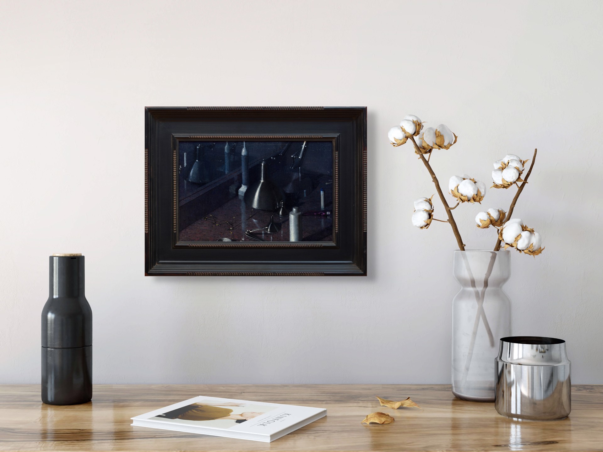 A dark, moody still life featuring metallic funnels and paint tubes on a reflective surface.