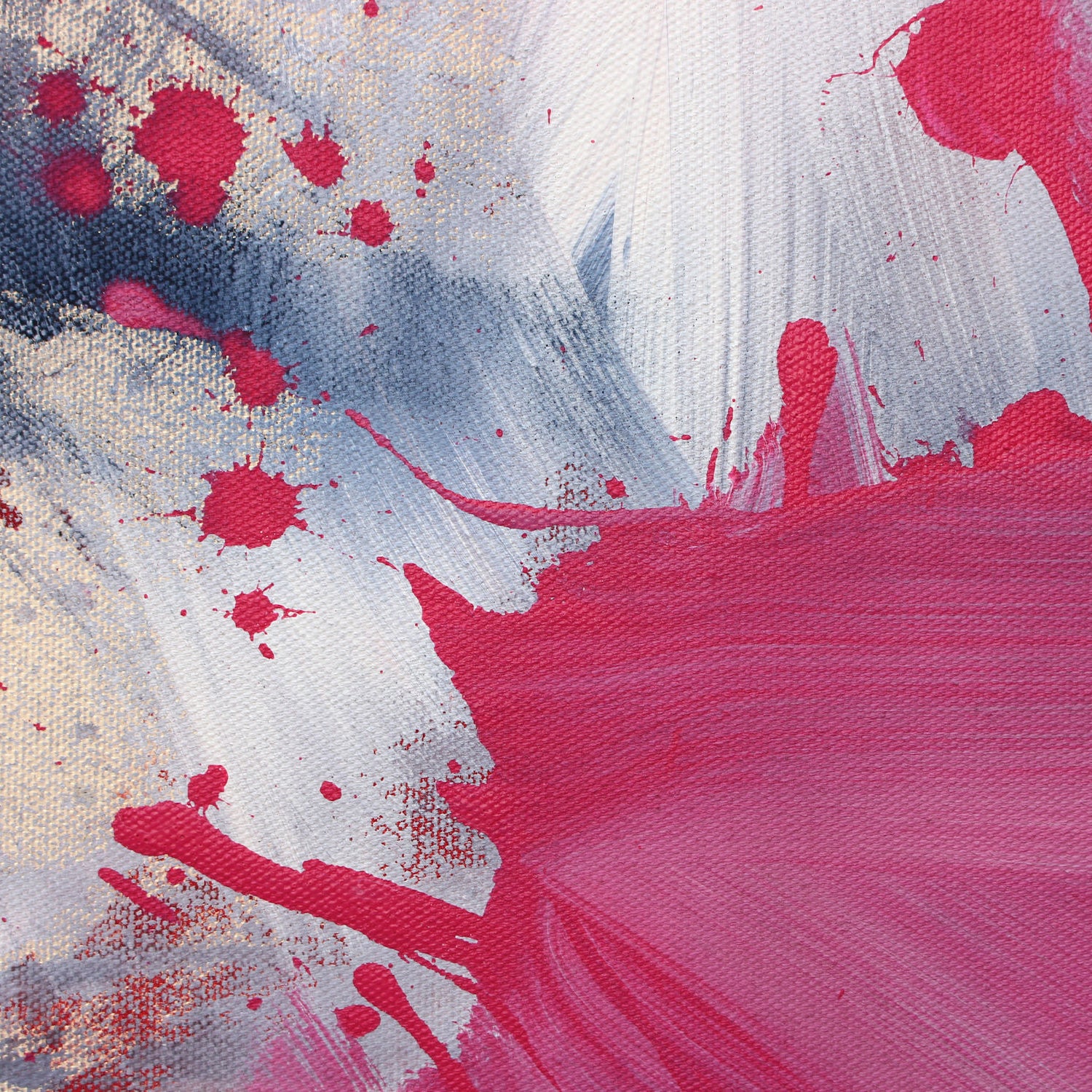 A painting with pink and blue paint splatters on a white background.
