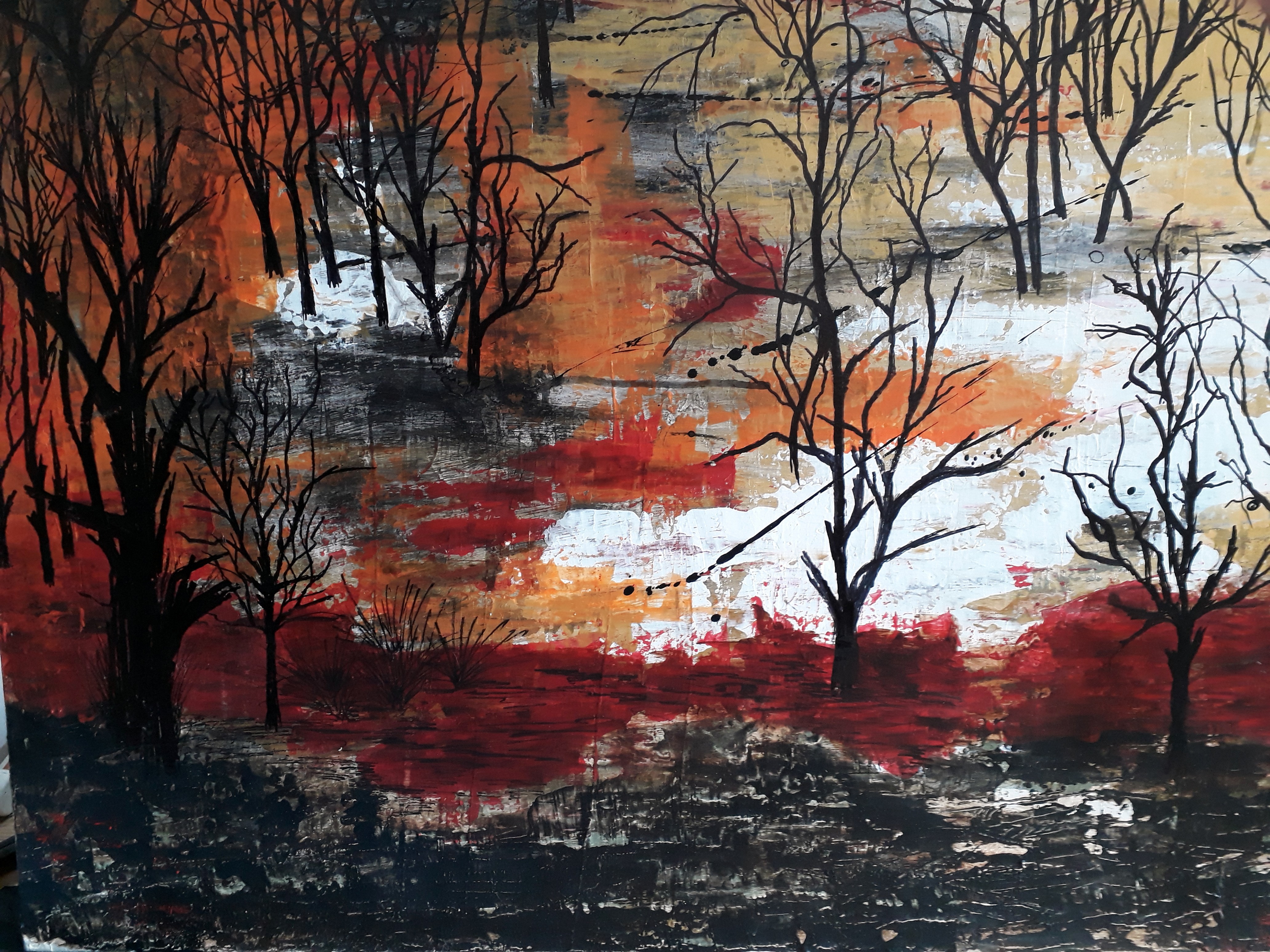 A painting of trees in a field with a sunset in the background.