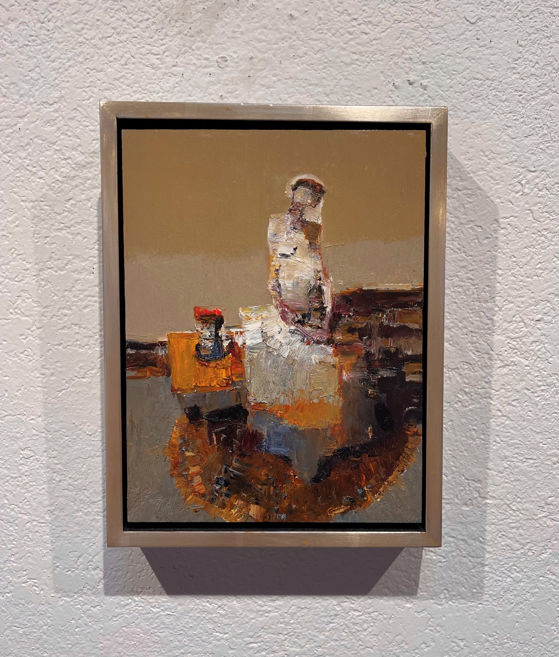 A figure sits in a contemplative pose, rendered with thick impasto brushwork against a muted brown background.