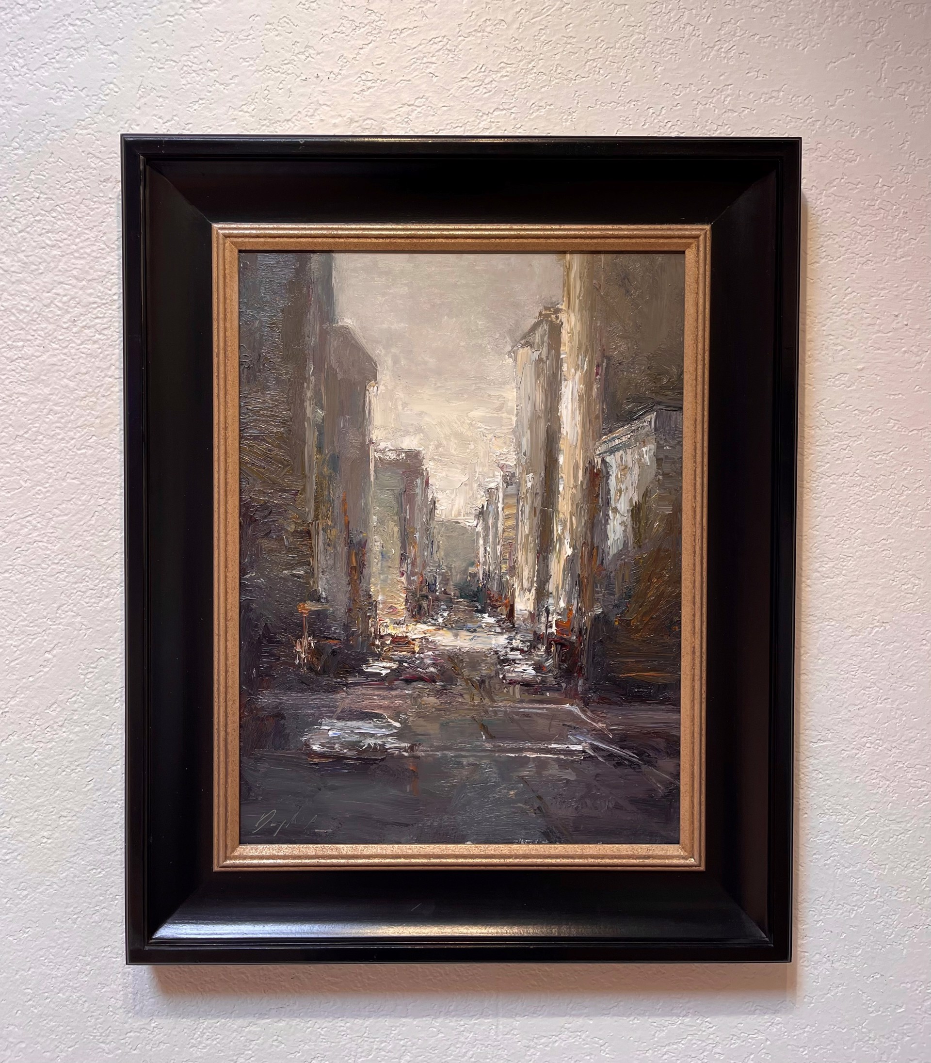 A painting of a city street in the rain.