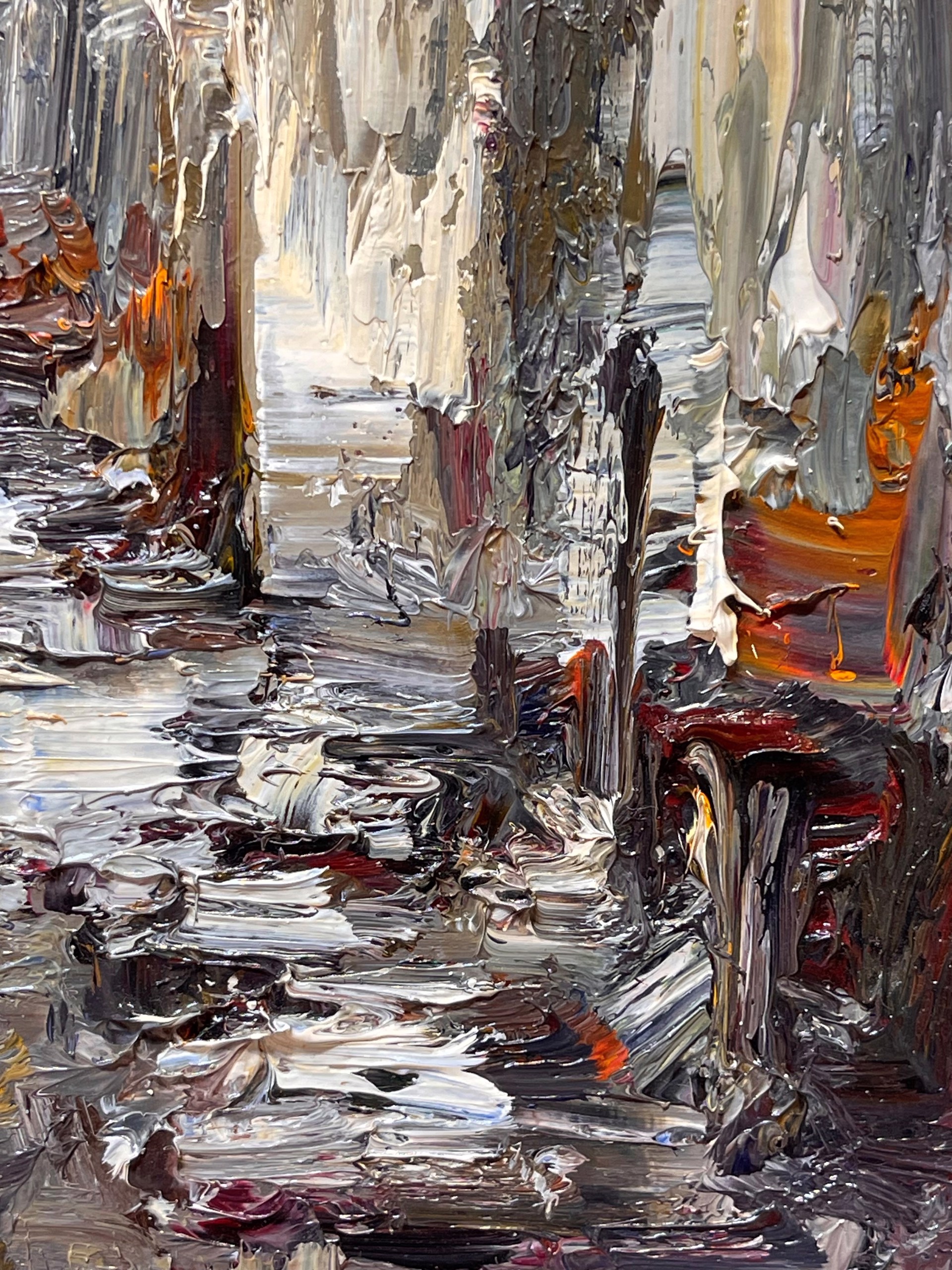 A painting of a city street in the rain.