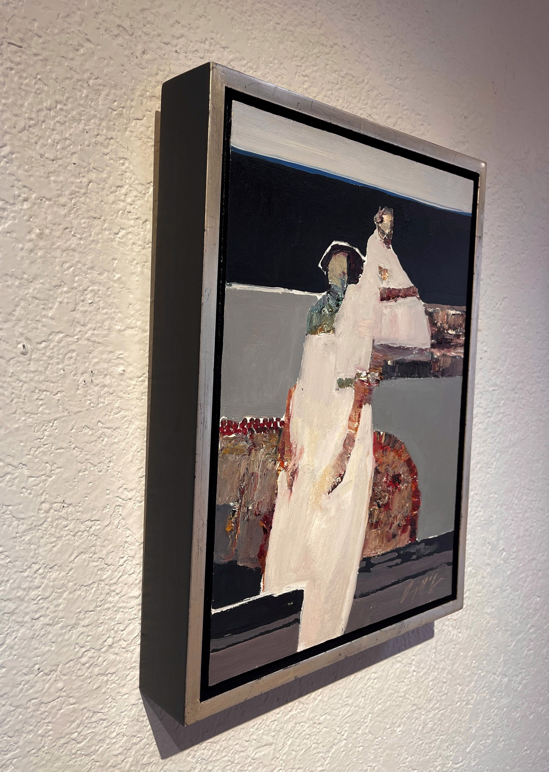 A bold, abstract painting of a figure in white against a dark background.