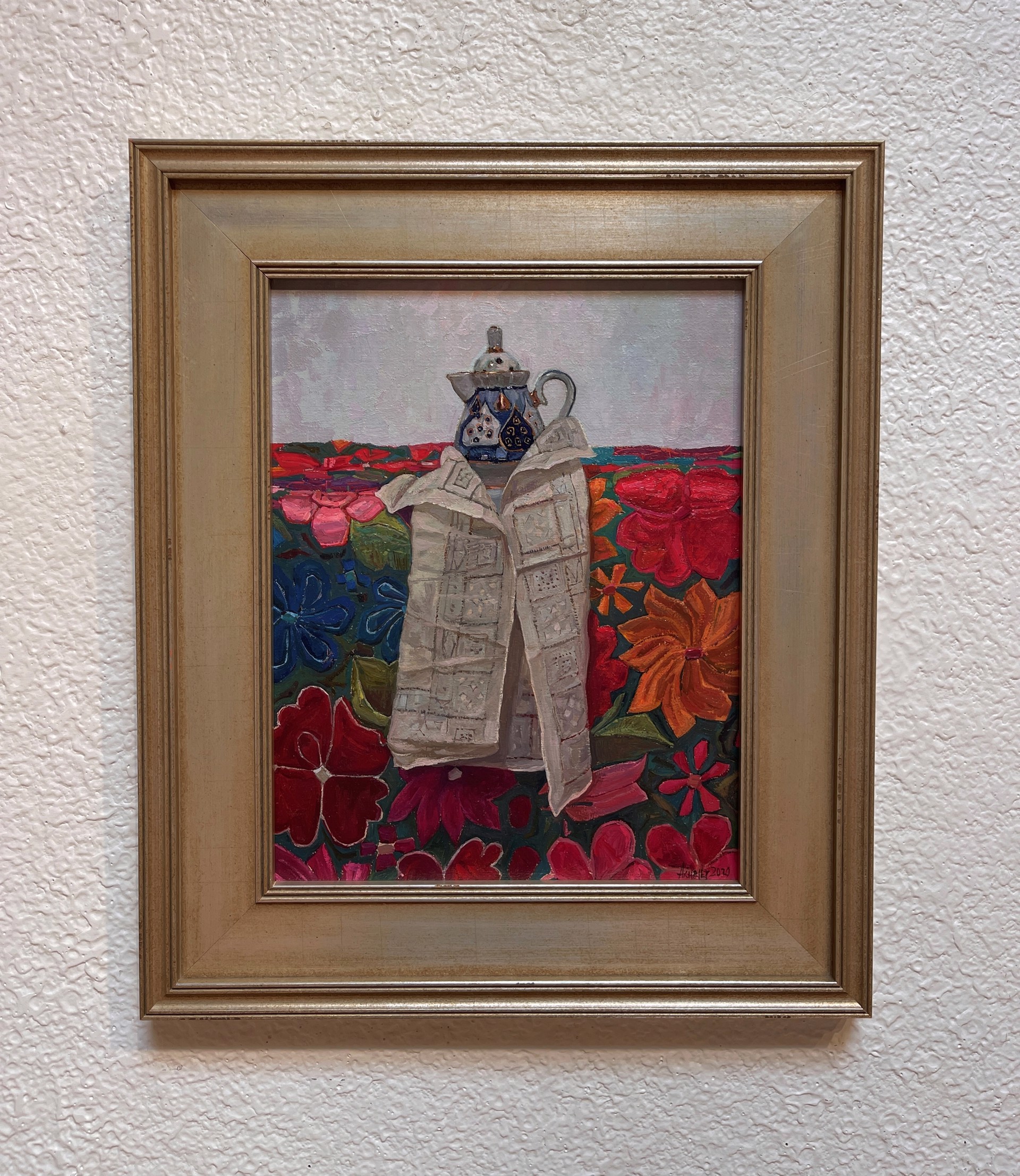 A painting of a teapot and a newspaper on a table with flowers.