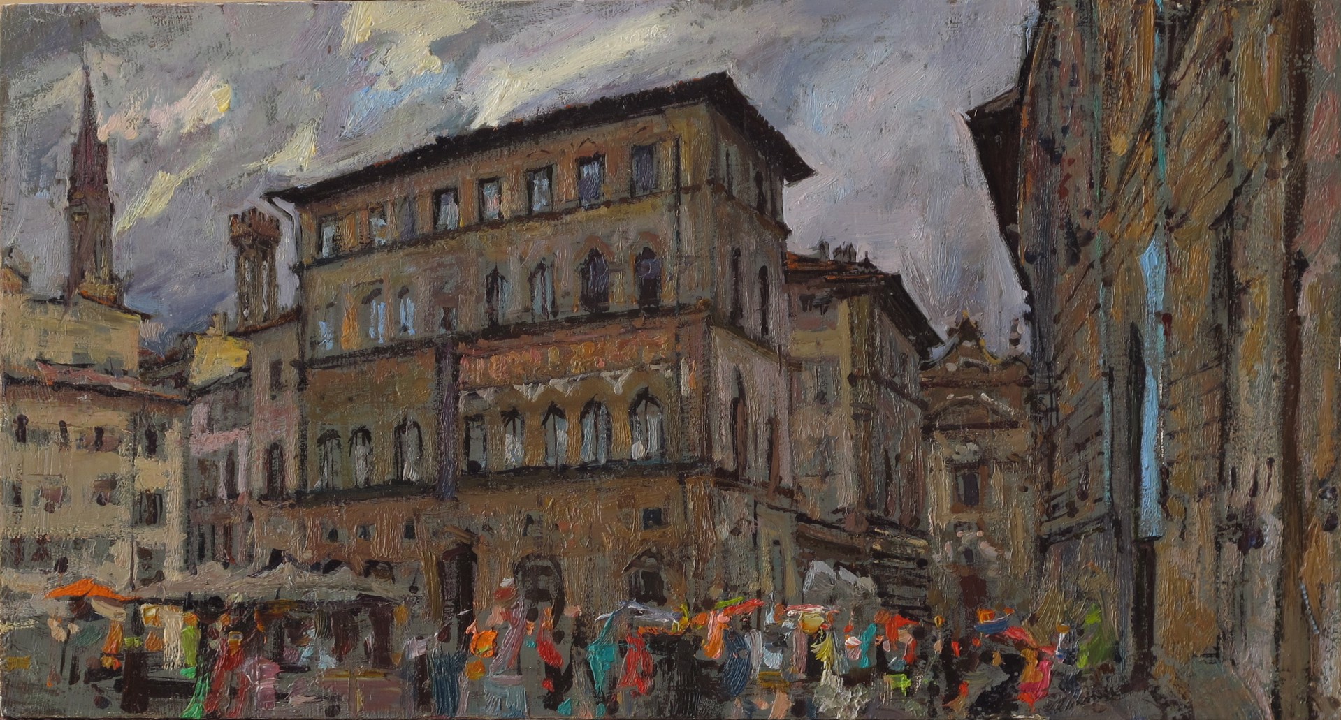 A vibrant street scene in an old European city filled with colorful umbrellas and historic architecture.