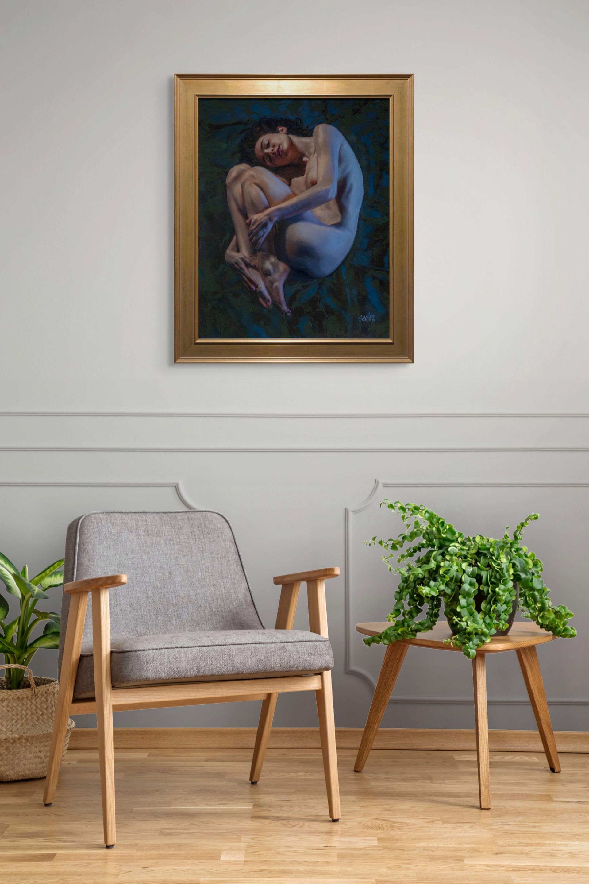 A painting of a nude woman laying down on a blue background.