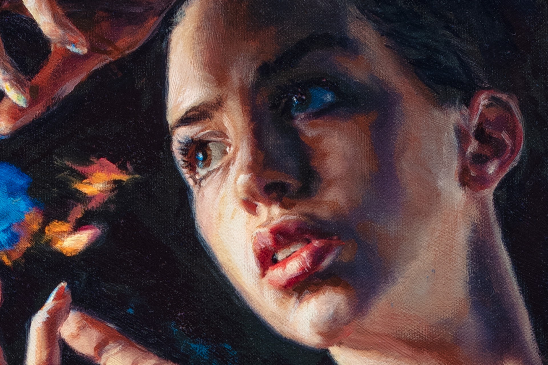 A nude figure stands in a dramatic pose, holding a stream of blue and orange flames.