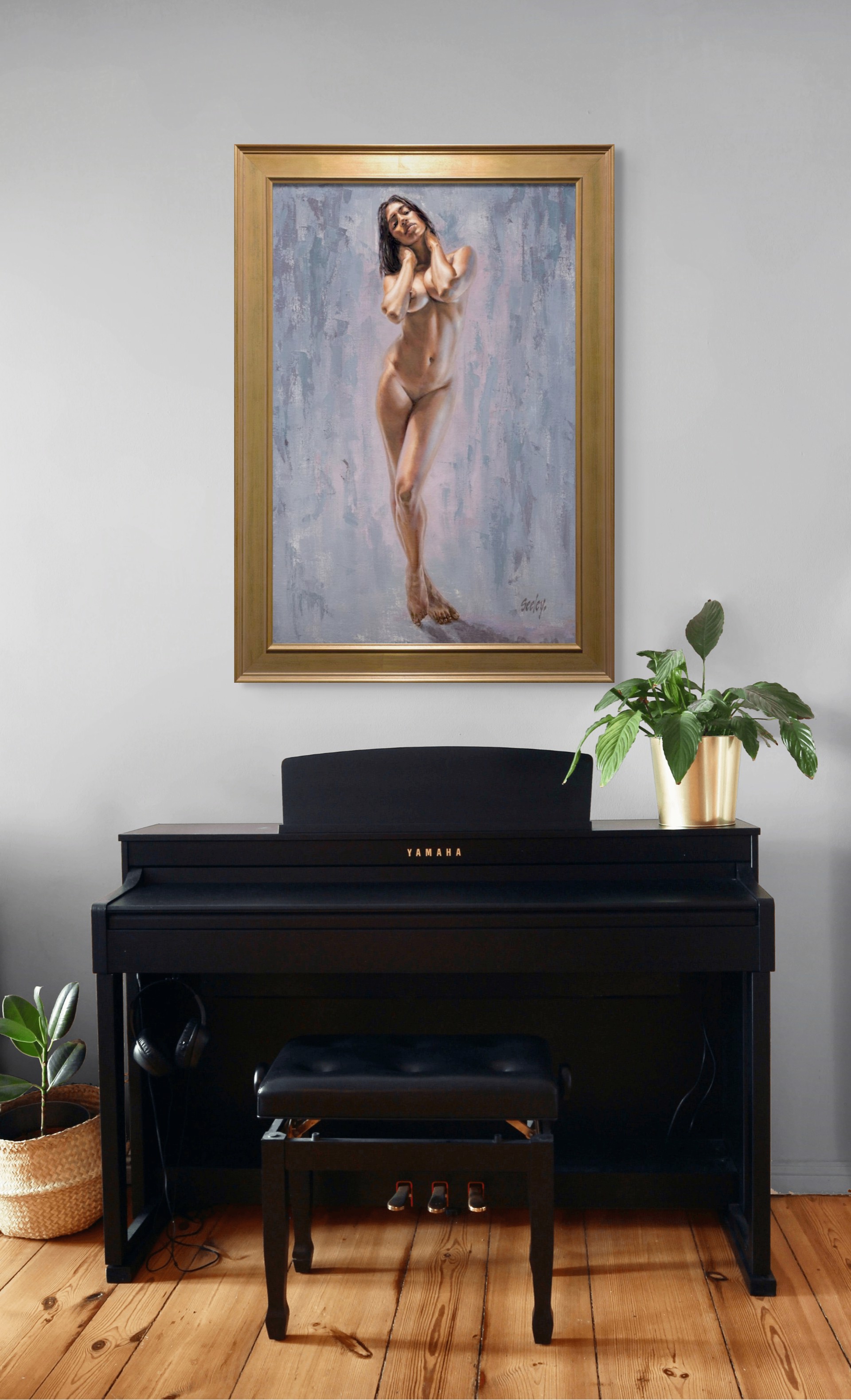 A nude female figure stands in a poised, confident pose against an abstract textured background.