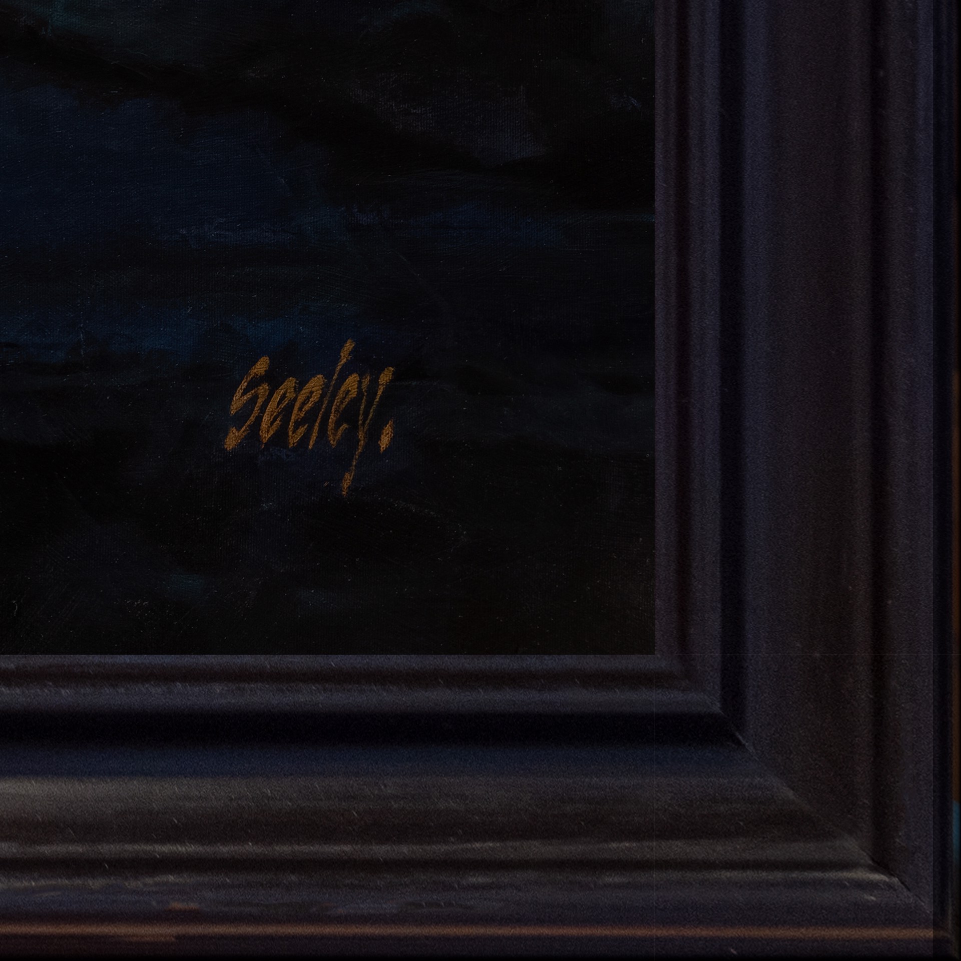 A figure with extensive colorful tattoos lies prone on a dark surface.