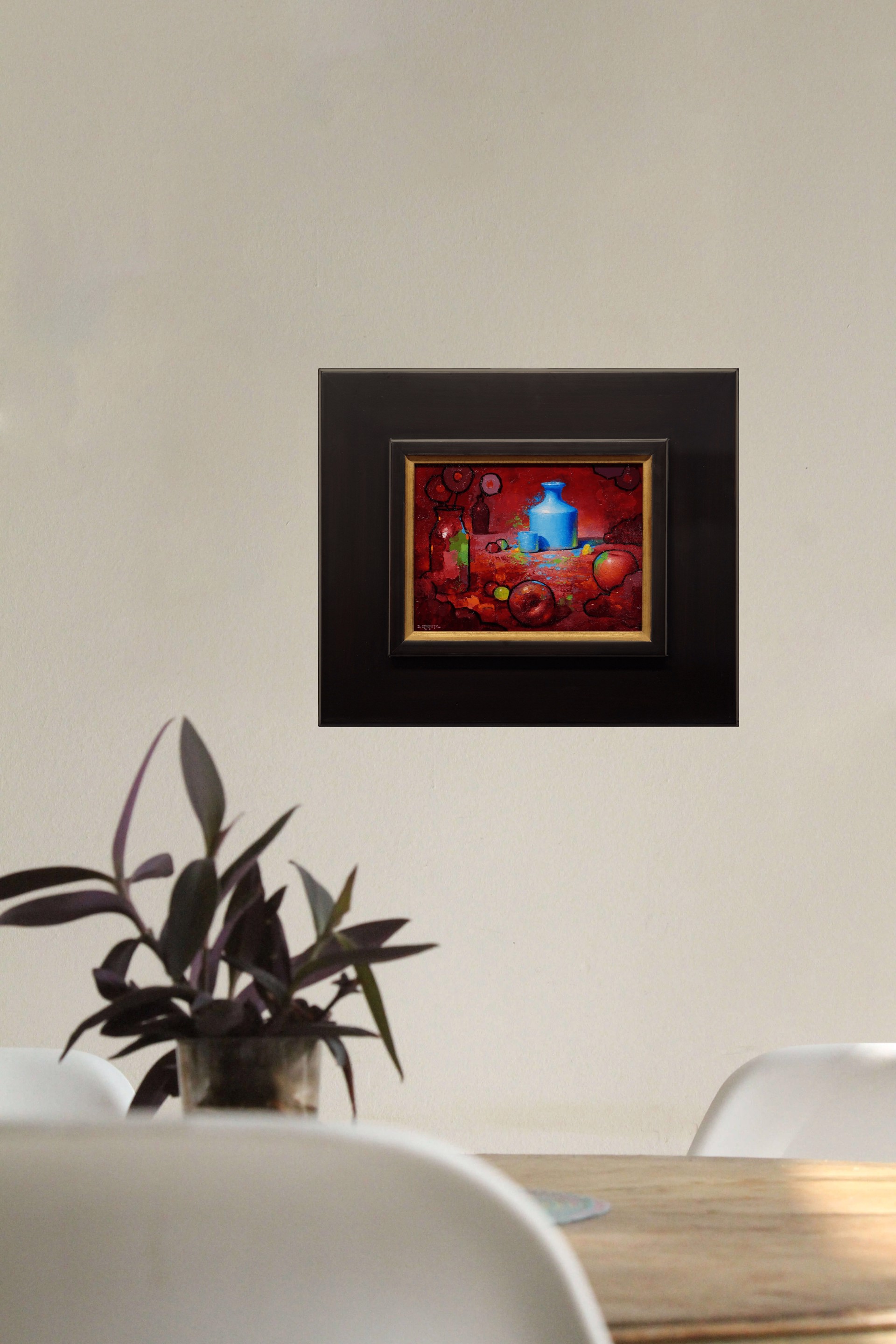 A vibrant still life featuring a blue vase, apples, and abstract shapes against a deep red background.