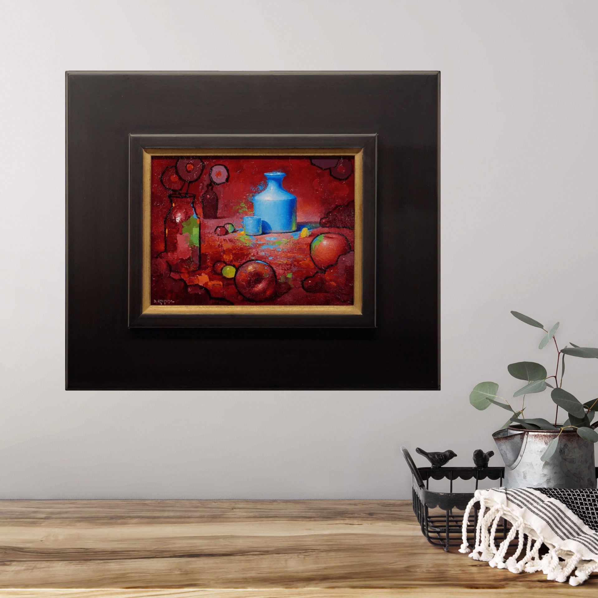 A vibrant still life featuring a blue vase, apples, and abstract shapes against a deep red background.