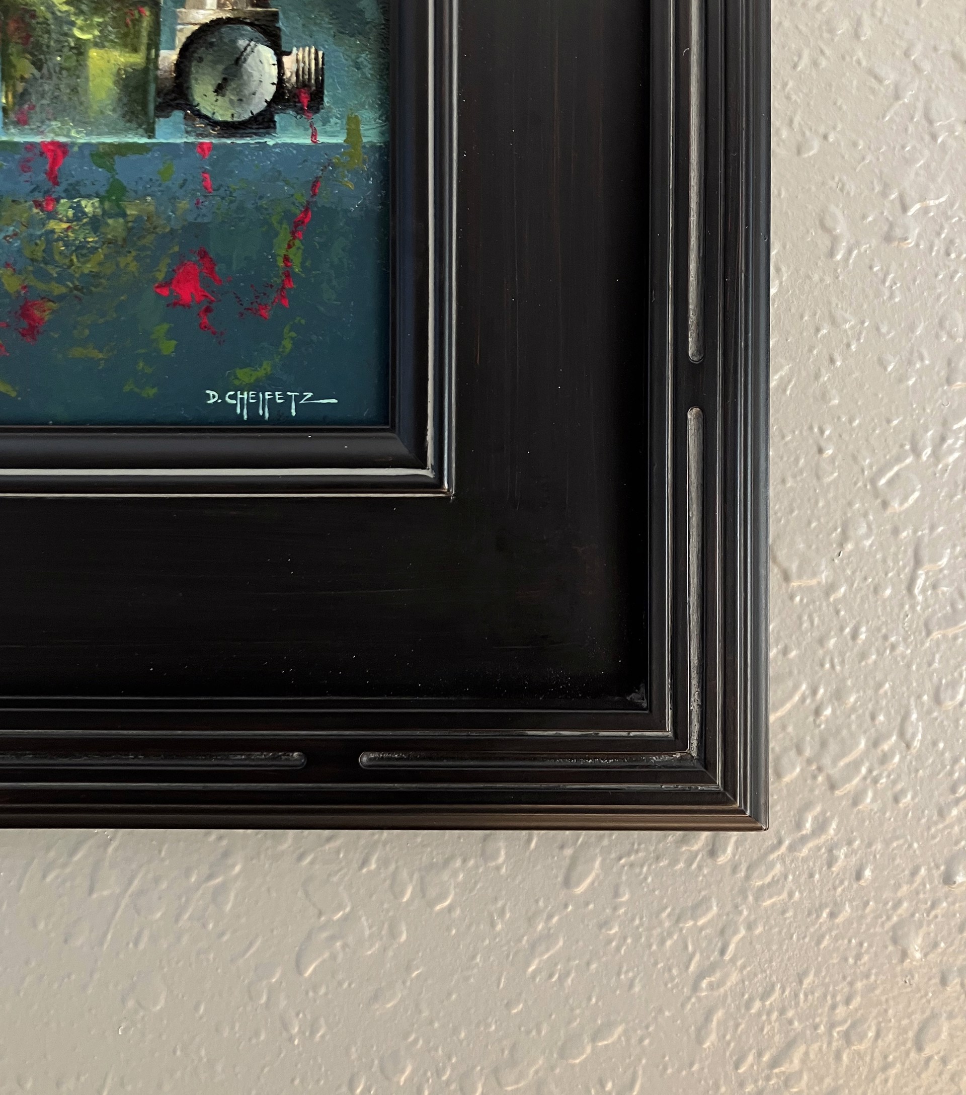 A still life painting featuring industrial and organic objects arranged on a reflective surface.