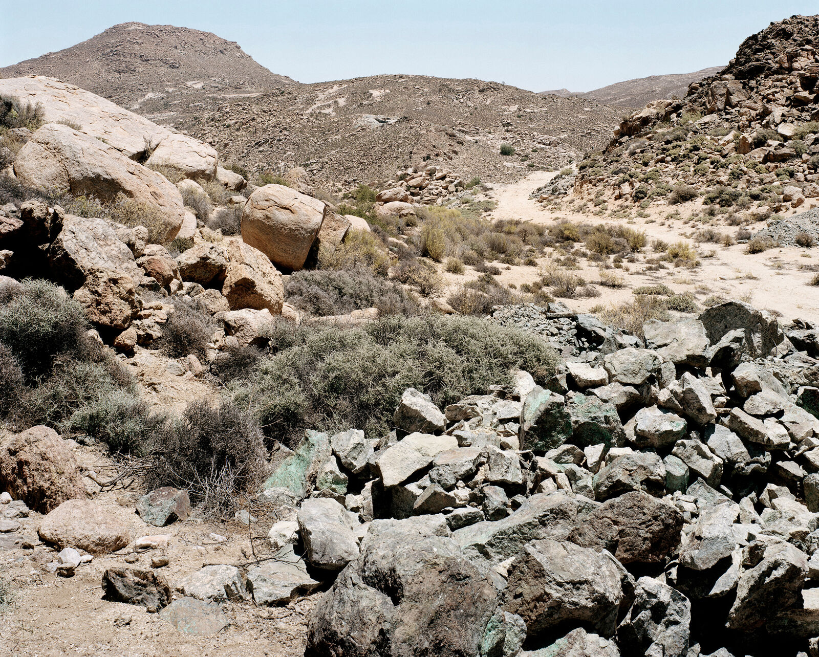 Copper-bearing rocks, near the workings started by Simon Van Der Stel governor of the Cape, during an expedition in 1650, Carolusberg, Namaqualand, Northern Cape. 1 January 2004 by David Goldblatt, 2004