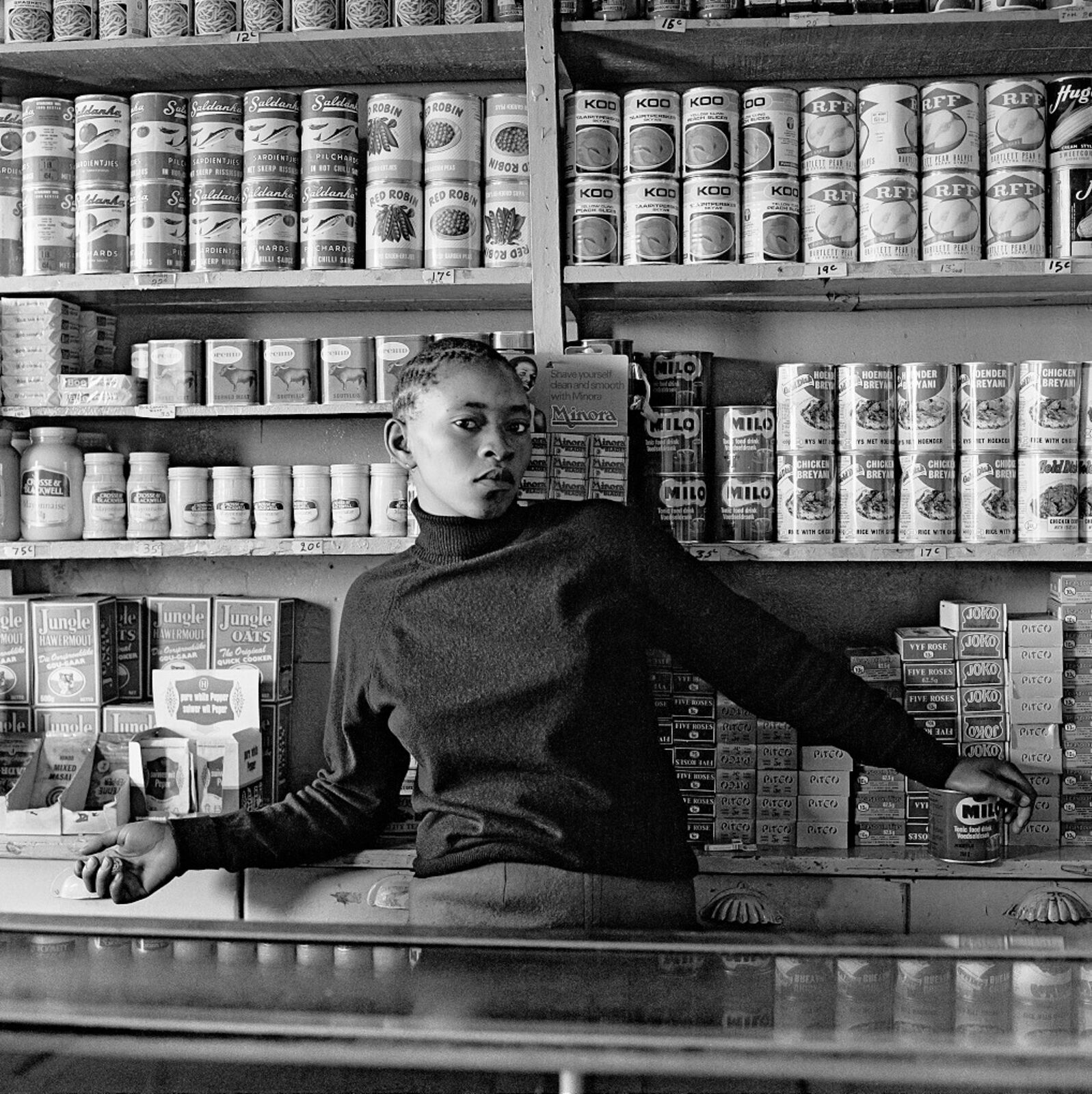 Shop assistant, Orlando West, 1972 by David Goldblatt, 1972