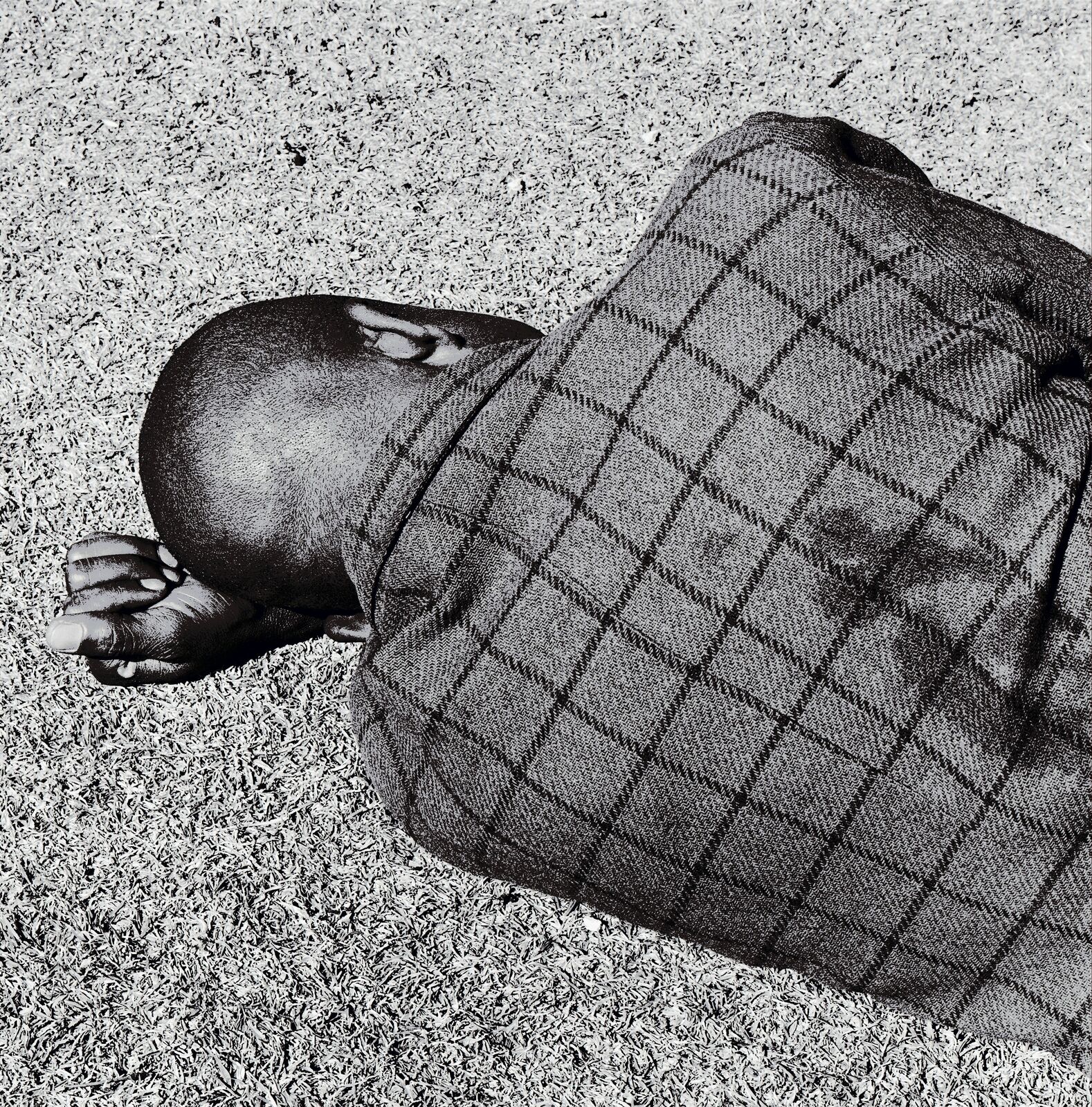 Sleeping man, Joubert Park, Johannesburg by David Goldblatt, 1975