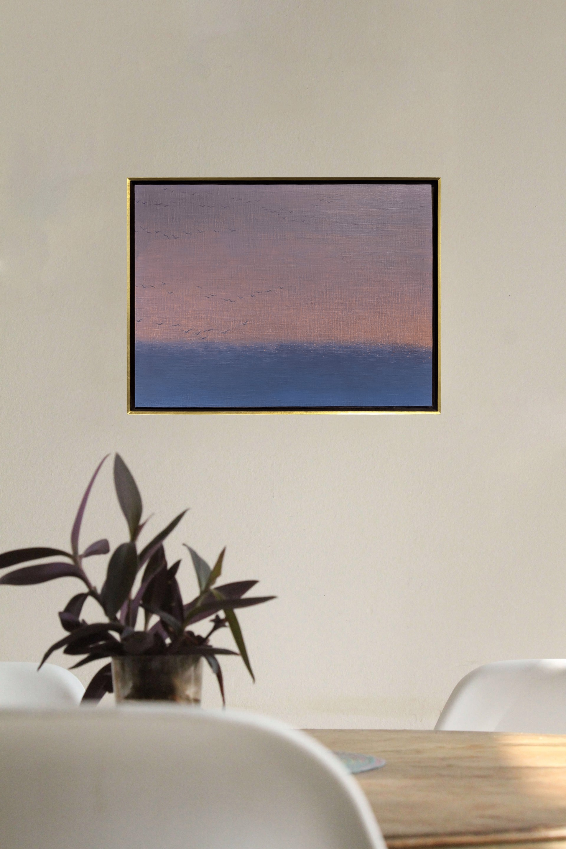 A serene seascape painting featuring a flock of birds against a soft, pastel sky.