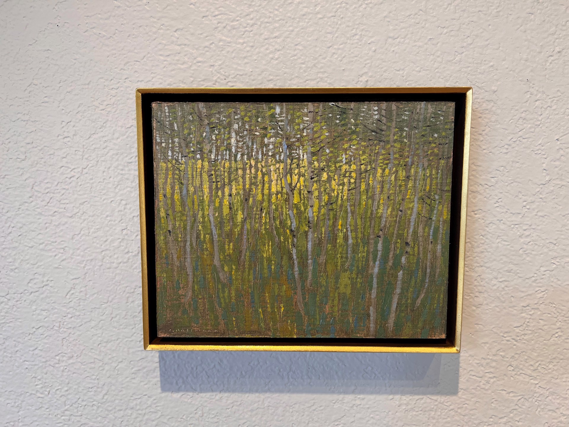 A painting of a forest with trees in the background.