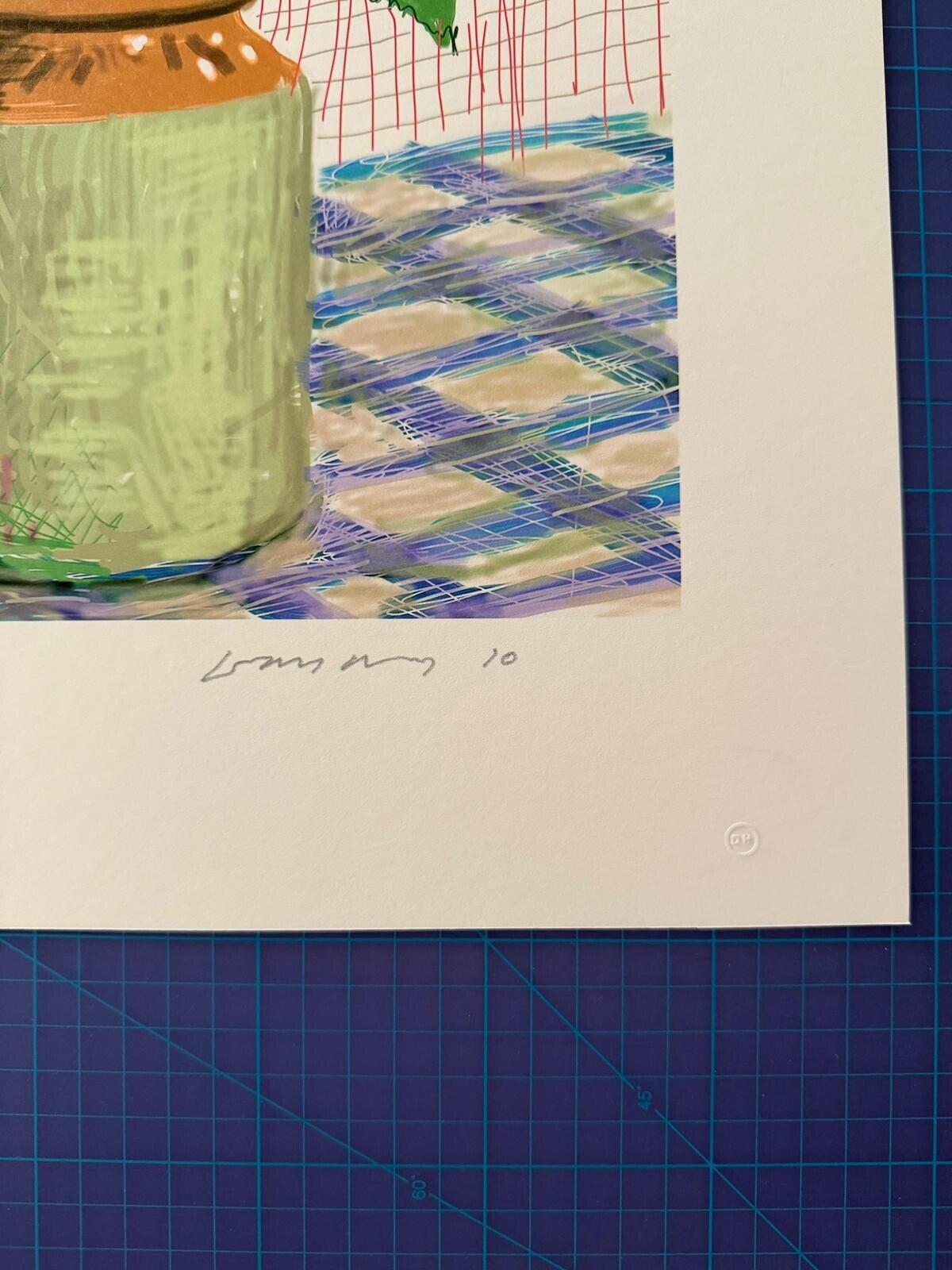 A vibrant still life of a colorful bouquet in a jar against a grid background.