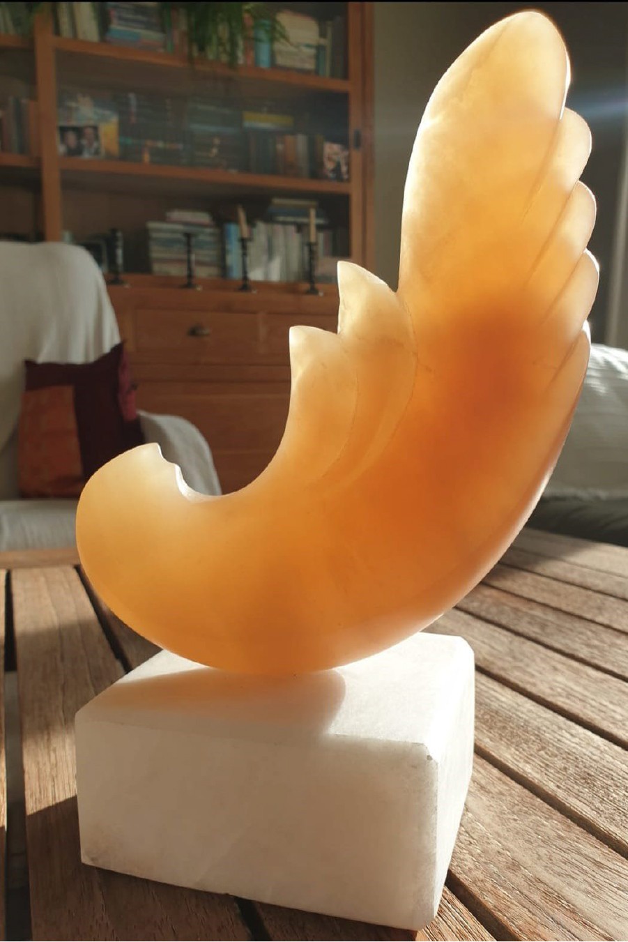 A lamp that is sitting on top of a table.