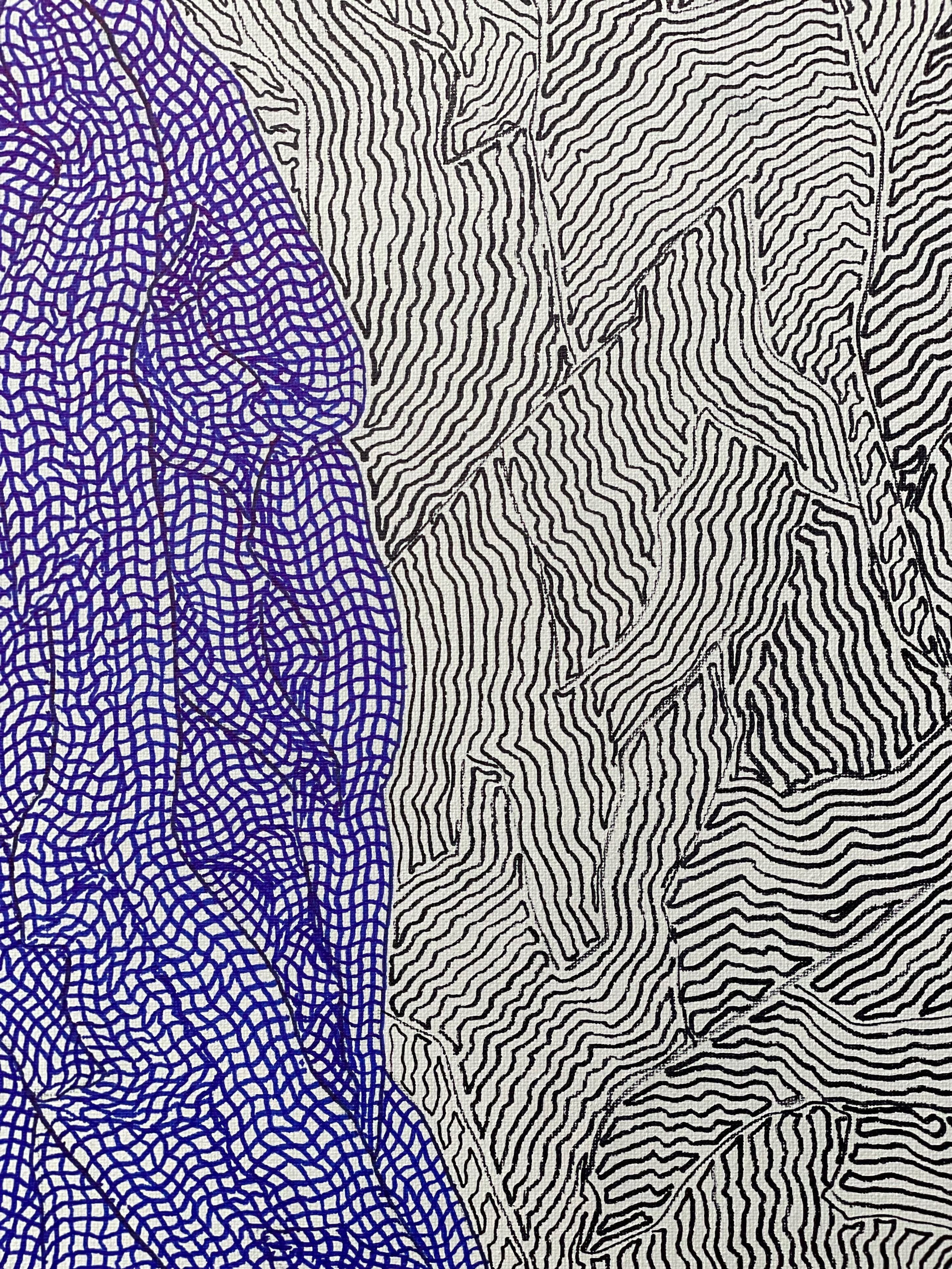 A close up of a drawing of a woman's face on a piece of paper.