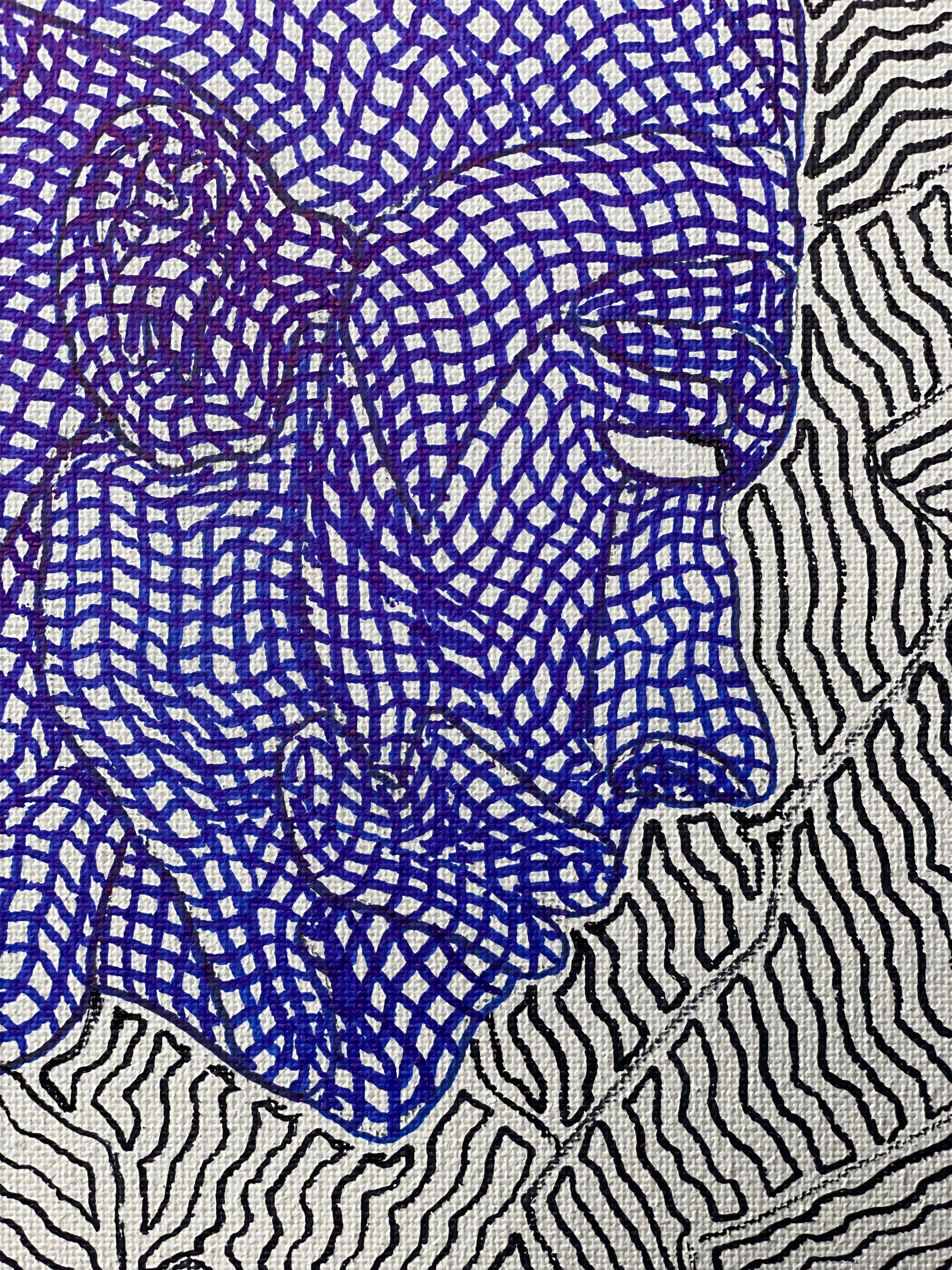 A close up of a drawing of a woman's face on a piece of paper.