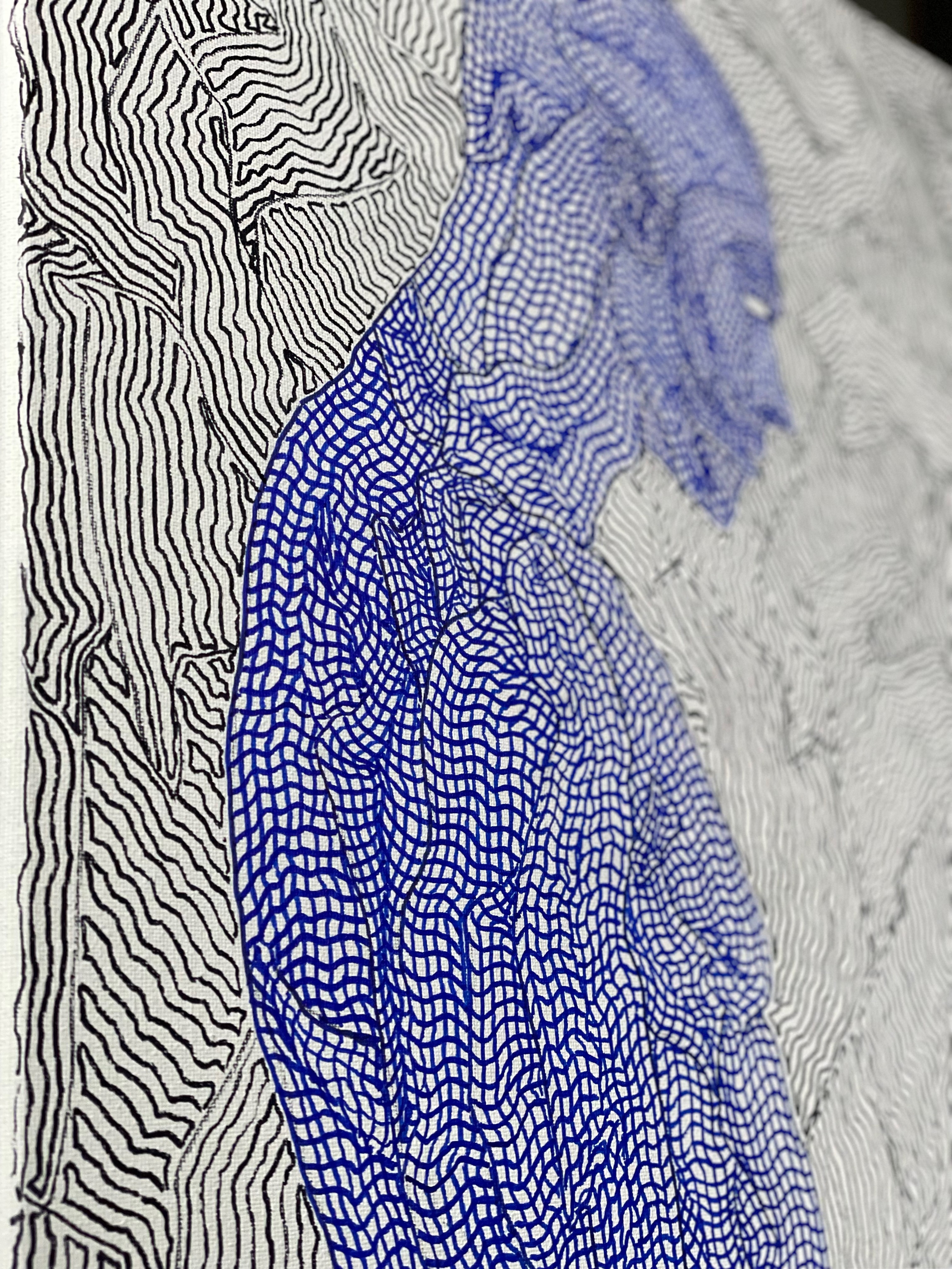 A close up of a drawing of a woman's face on a piece of paper.