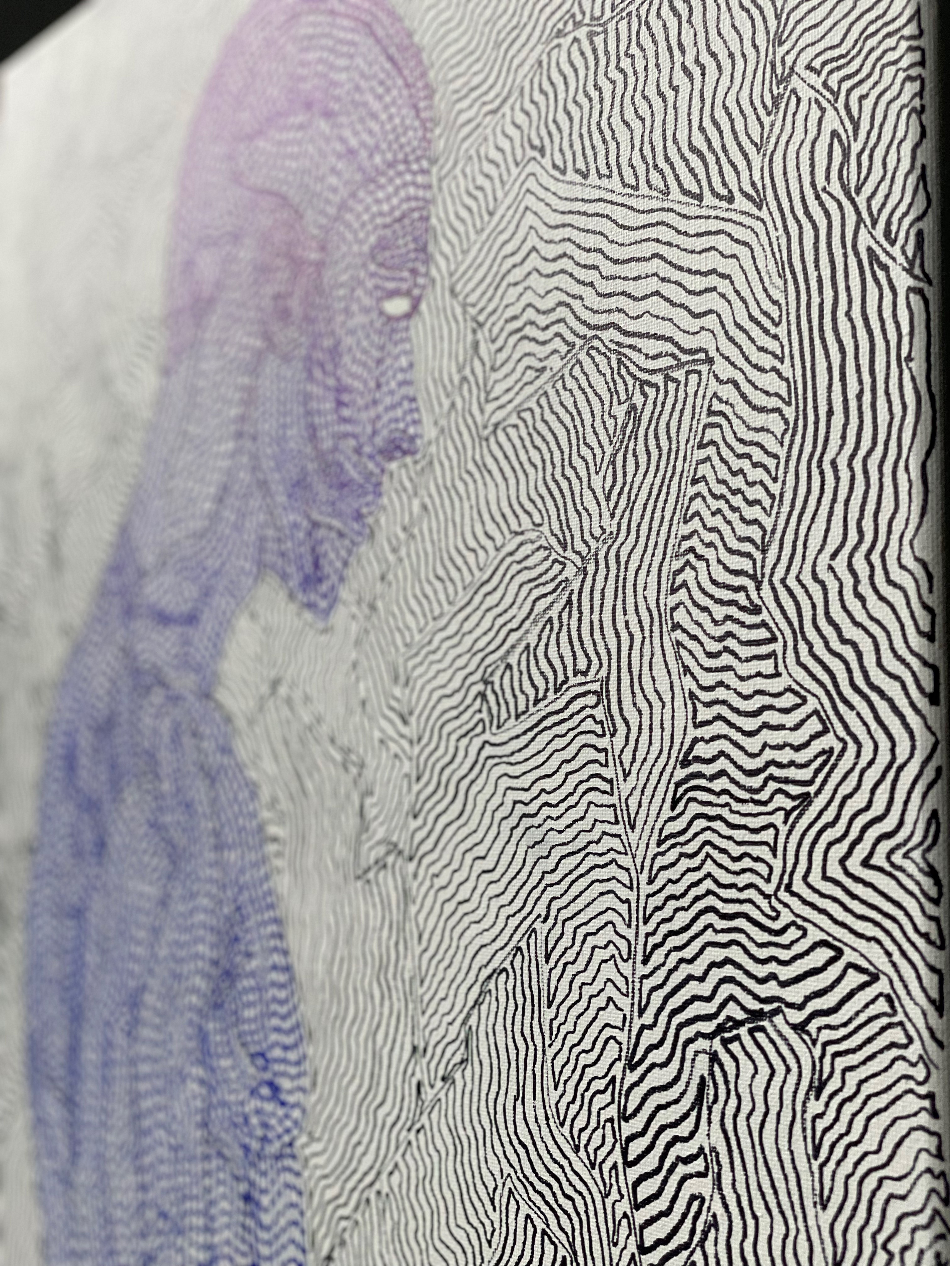 A close up of a drawing of a woman's face on a piece of paper.
