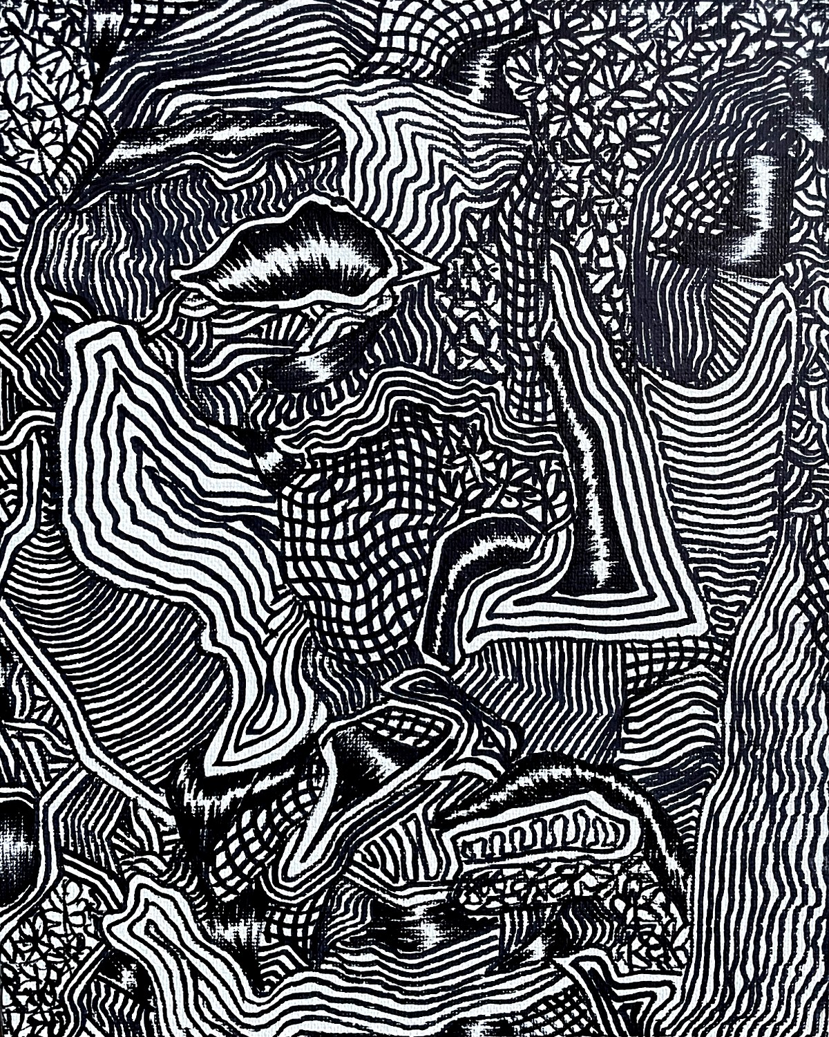 A black and white drawing hanging on a wall.