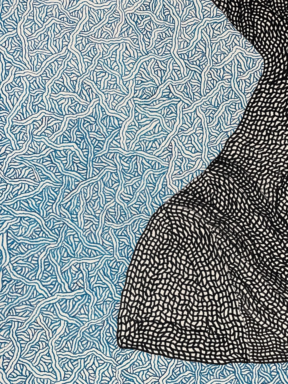A black and white drawing of a woman's face on a blue background.