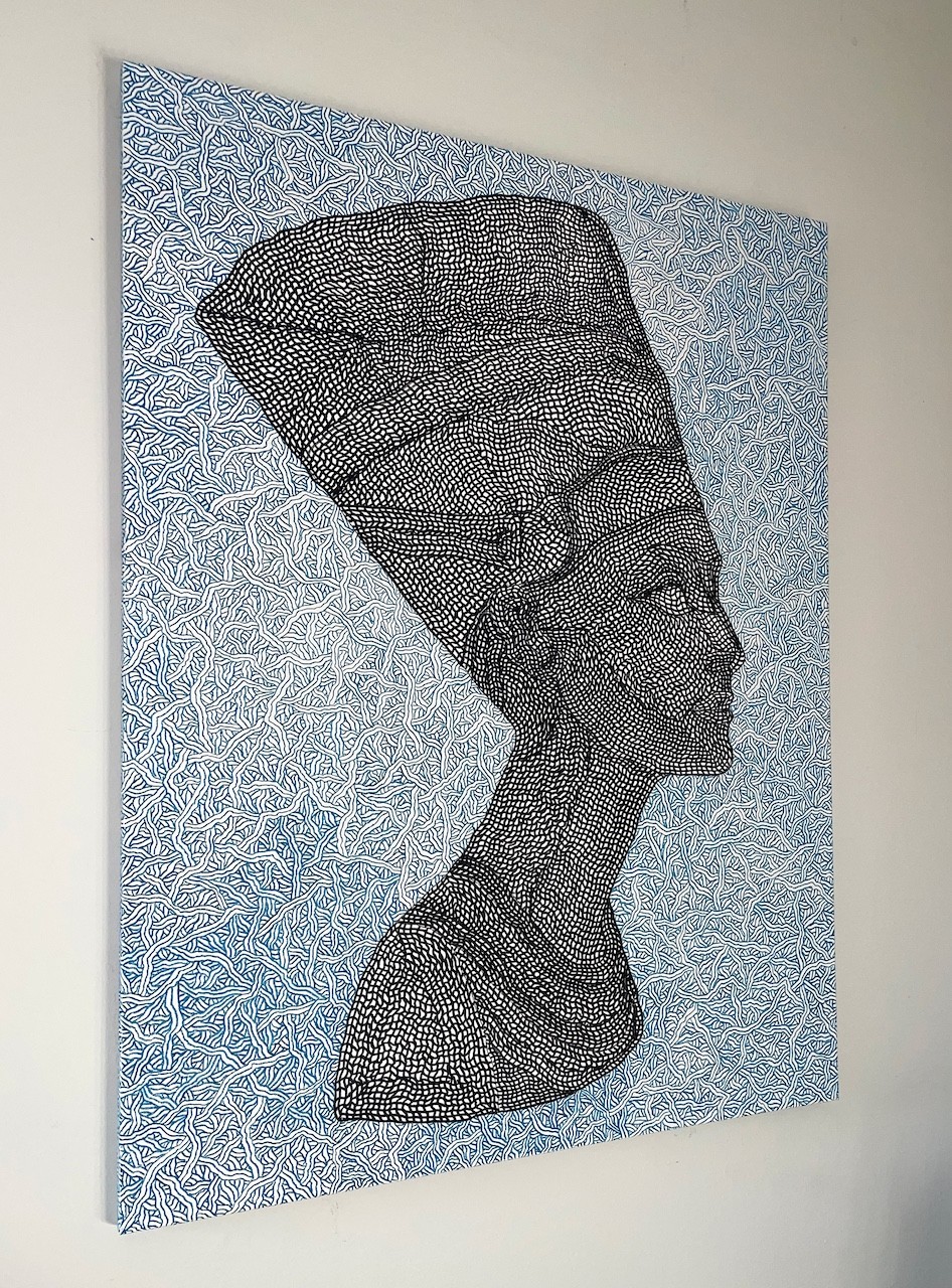 A black and white drawing of a woman's face on a blue background.