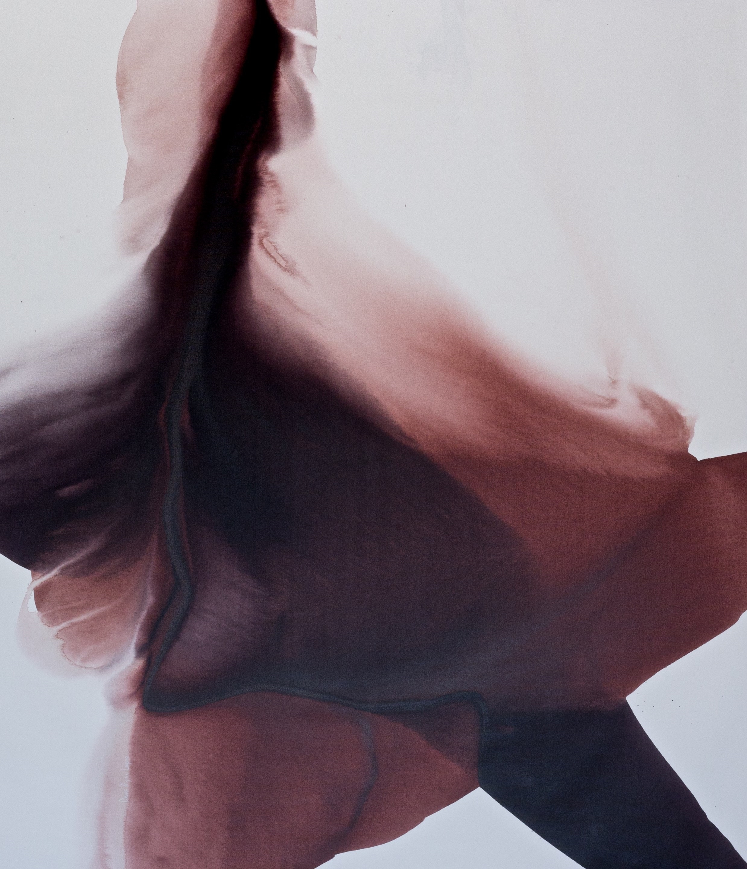 A black and white photo of a woman in a dress.