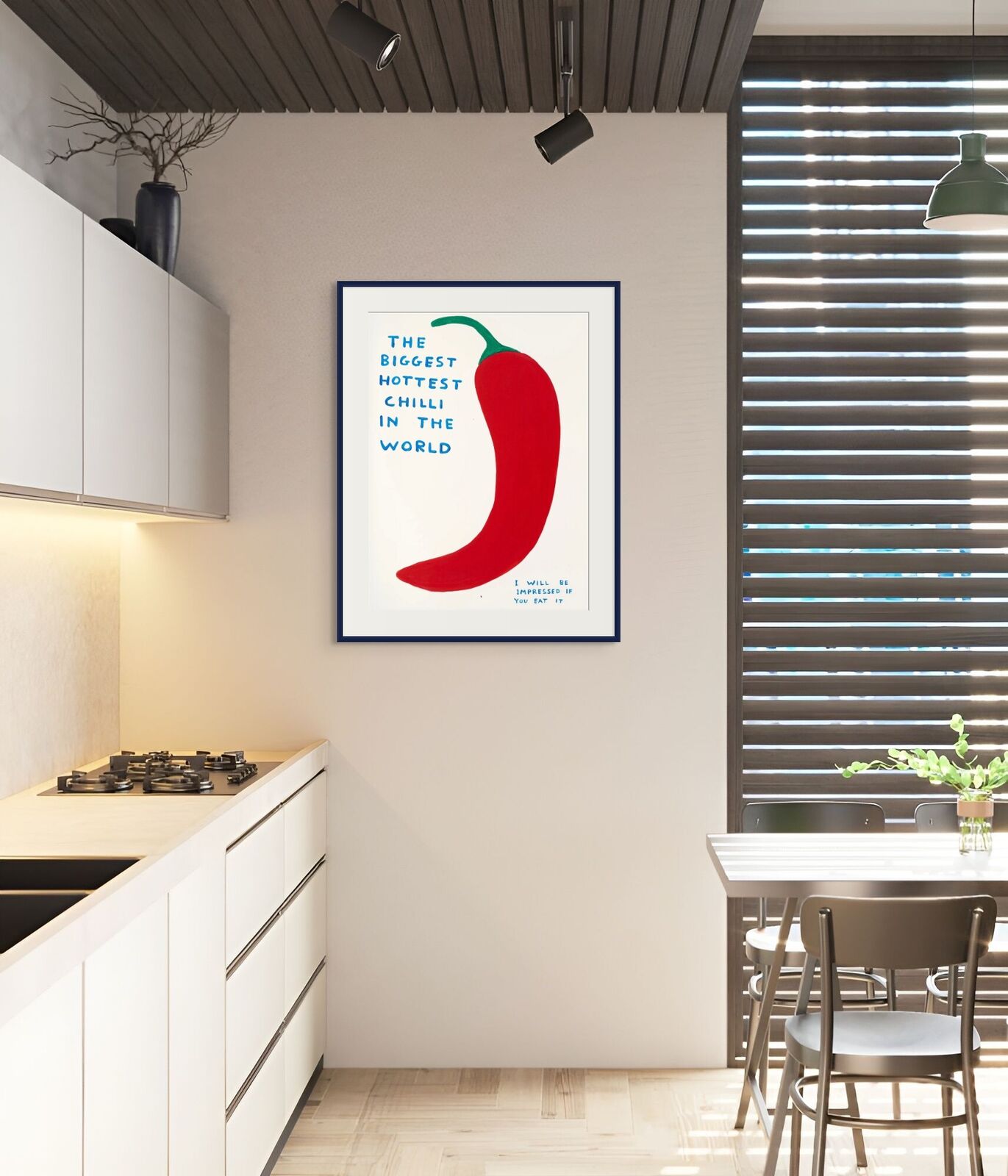 A red chili pepper with the words the biggest hottest chili in the world.