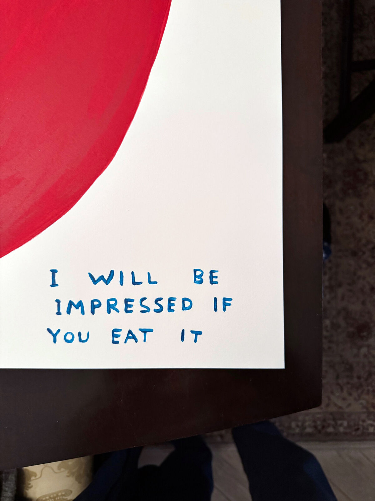 A red chili pepper with the words the biggest hottest chili in the world.