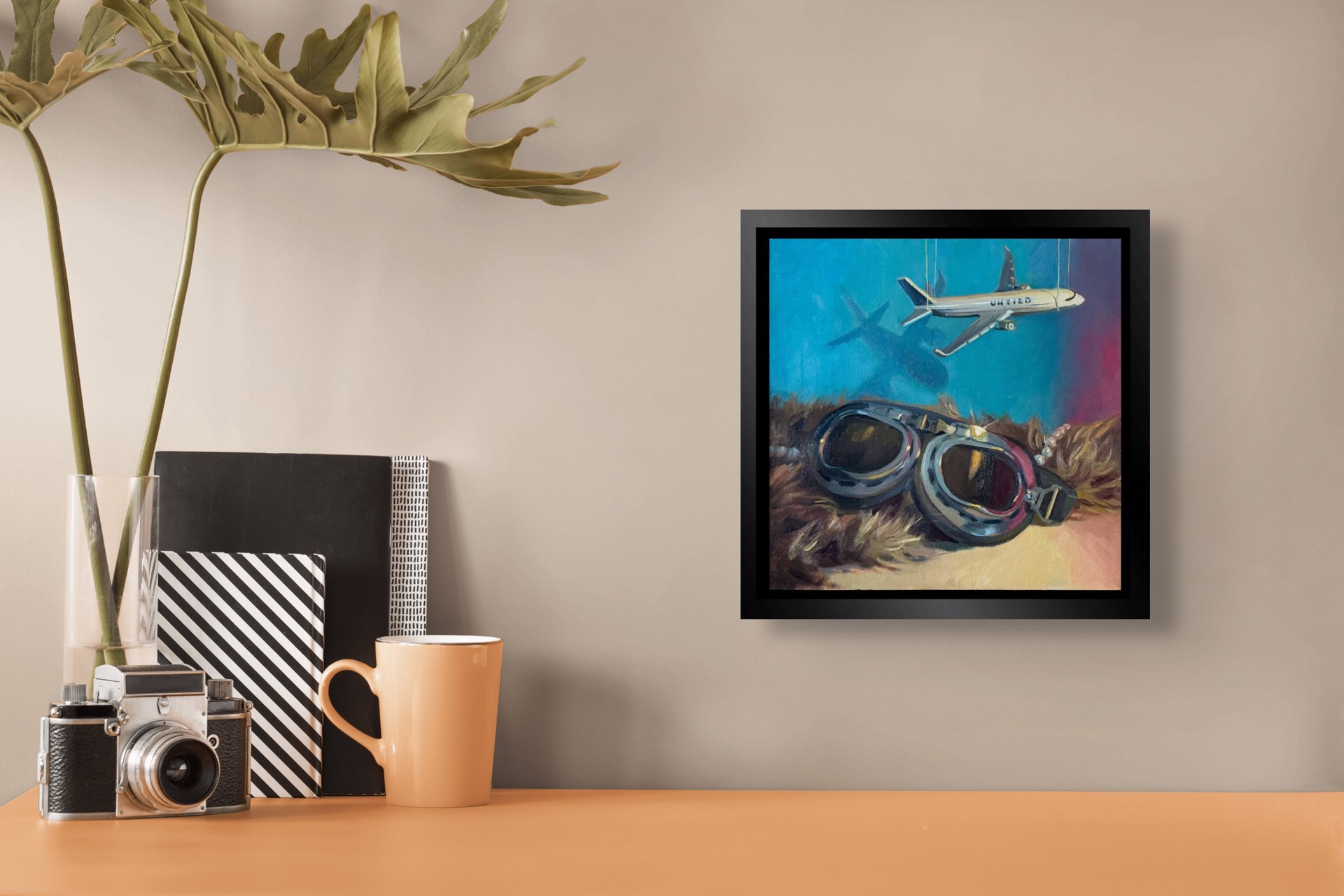 A surreal composition juxtaposing vintage aviator goggles with a suspended airplane model against a textured background.