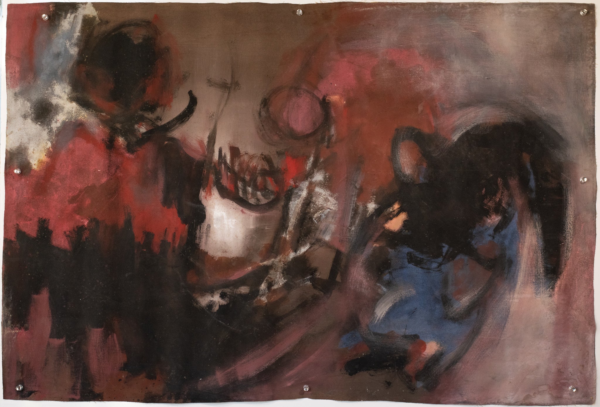 A painting of a woman's face on a piece of paper.