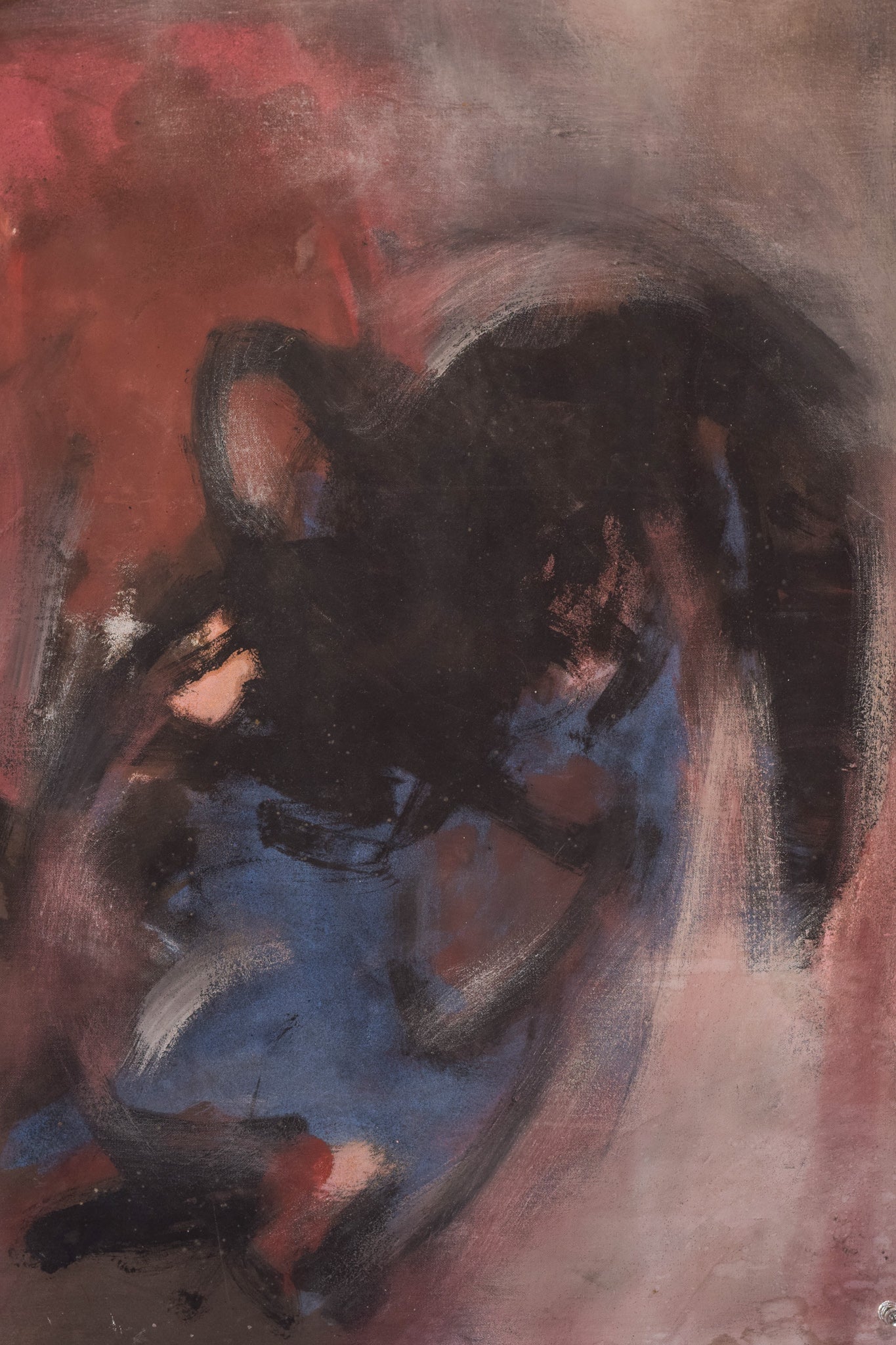 A painting of a woman's face on a piece of paper.