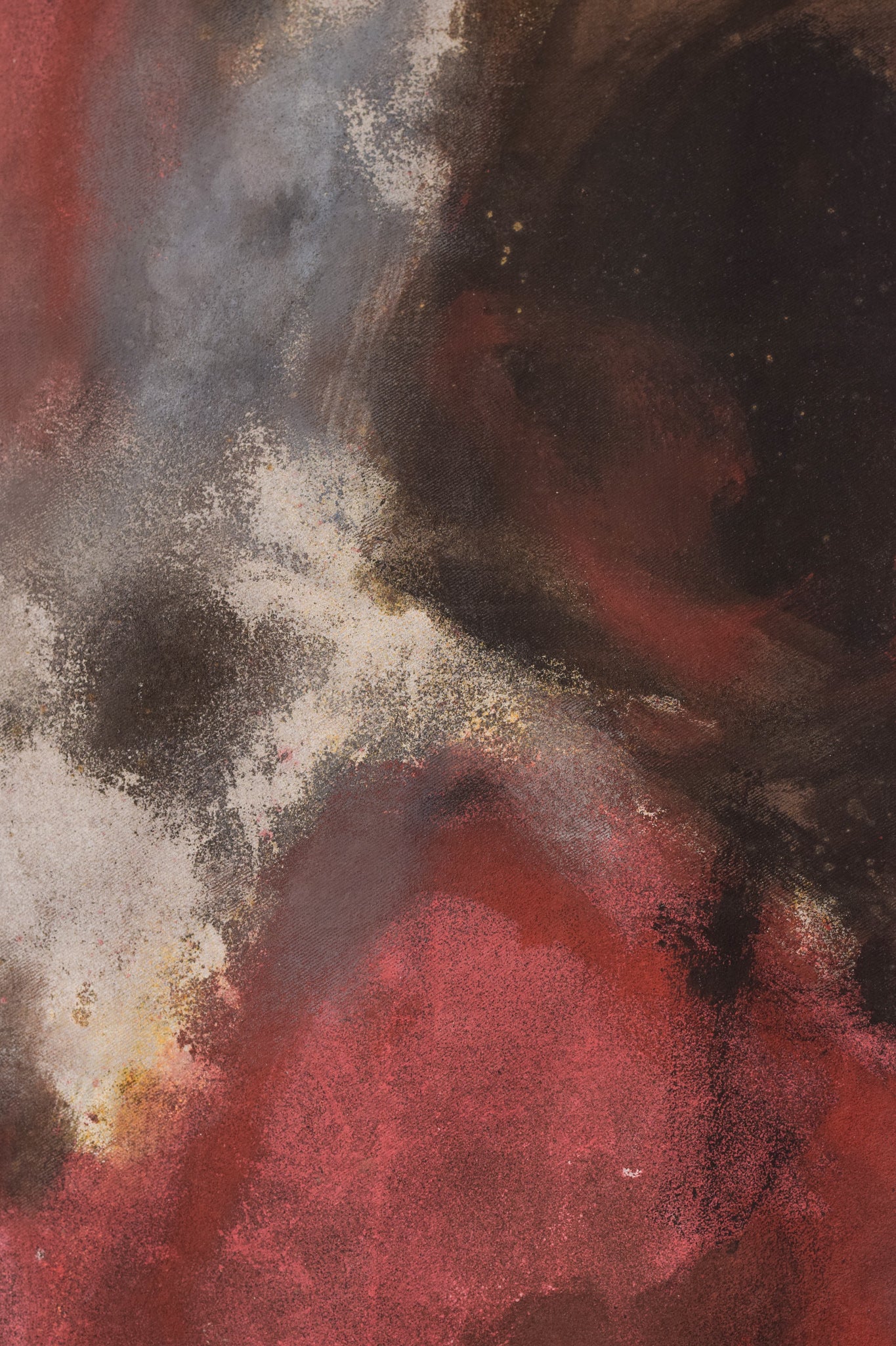 A painting of a woman's face on a piece of paper.