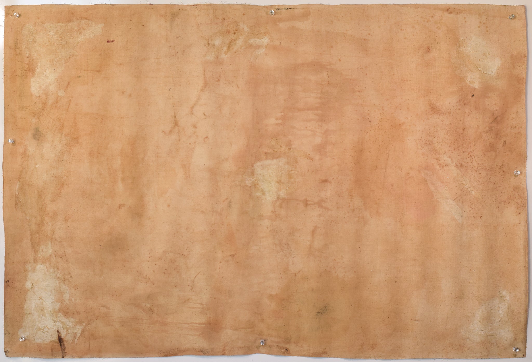 A painting of a woman's face on a piece of paper.