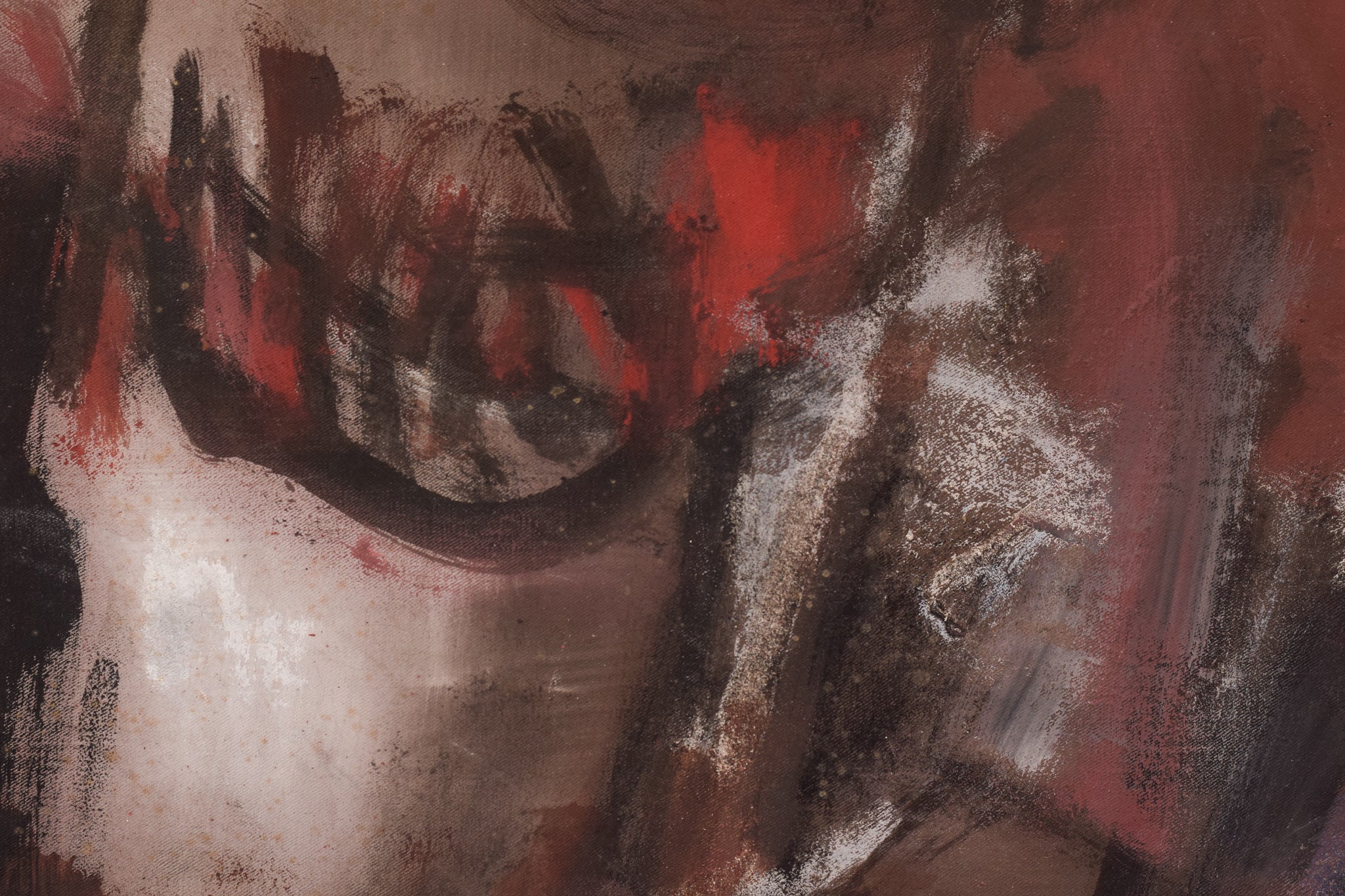 A painting of a woman's face on a piece of paper.