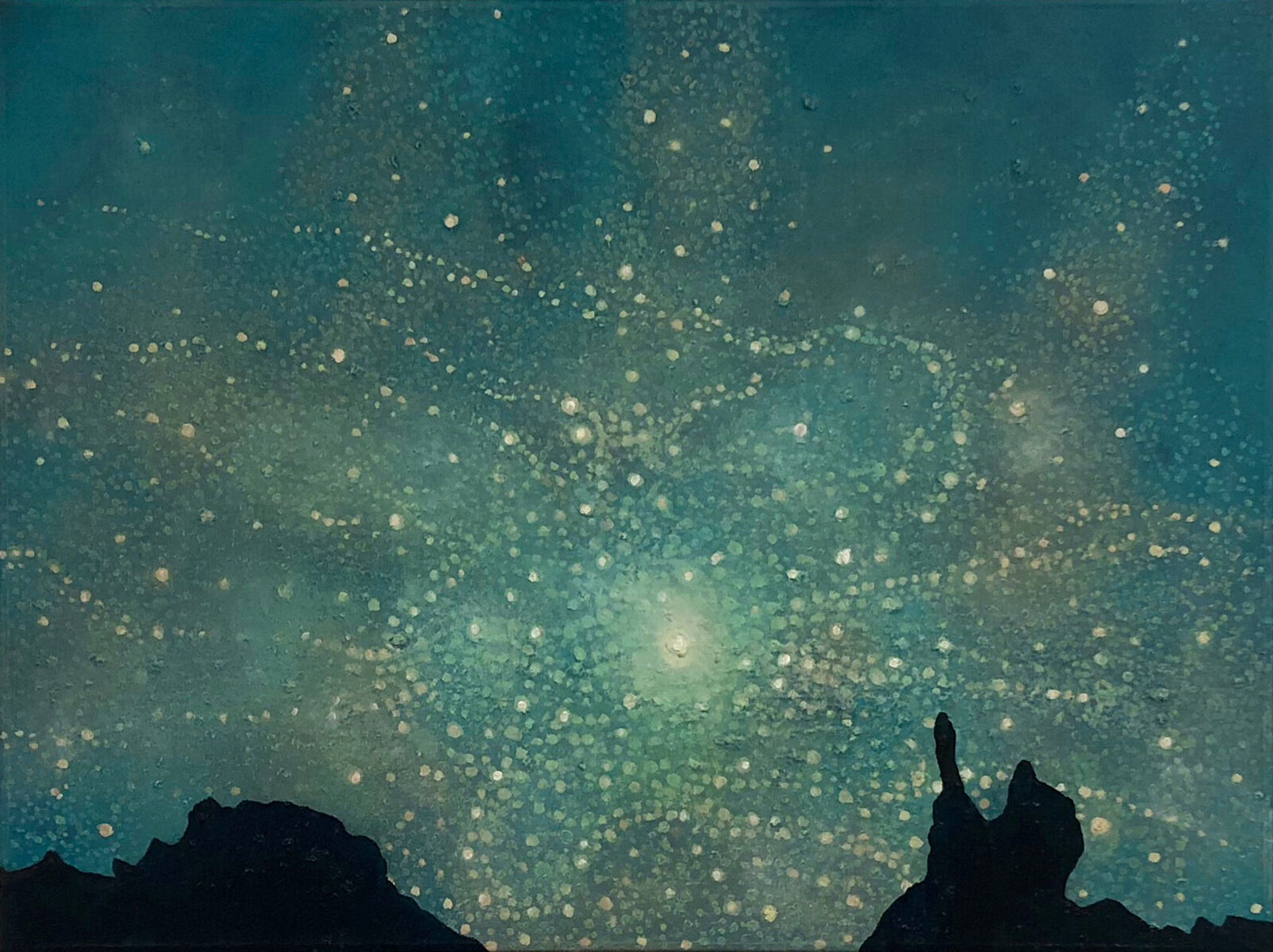 A starry night sky viewed from a rocky silhouette.
