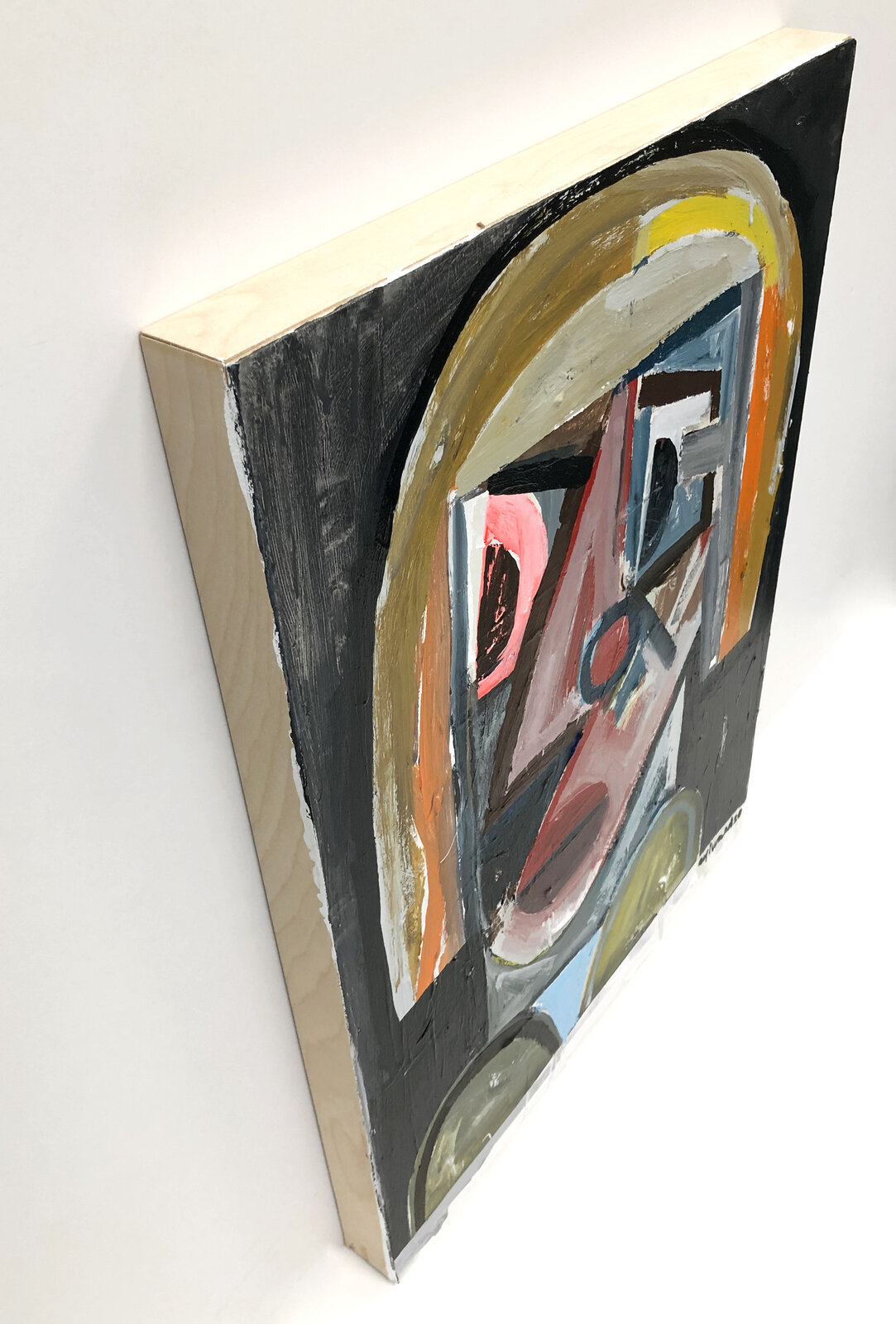 A painting of a woman's face on a black background.