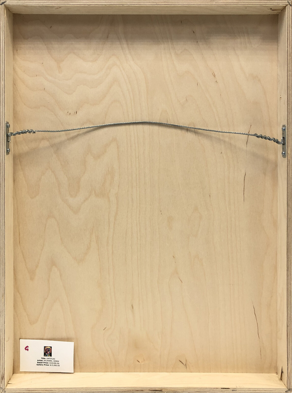 A painting of a woman's face on a black background.