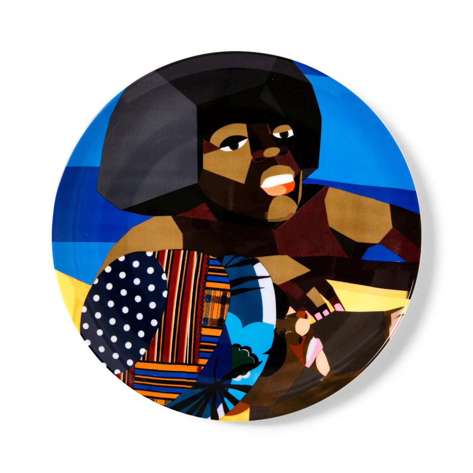 A plate with a painting of a woman holding a fan.