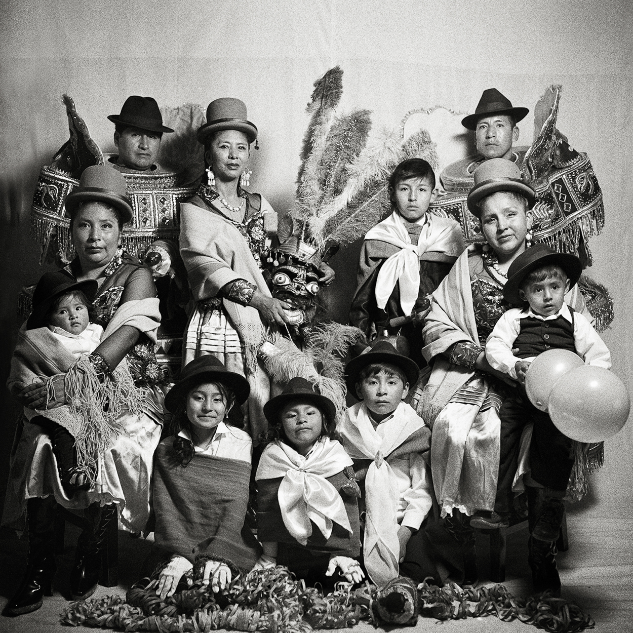 A group of people dressed in costumes posing for a picture.