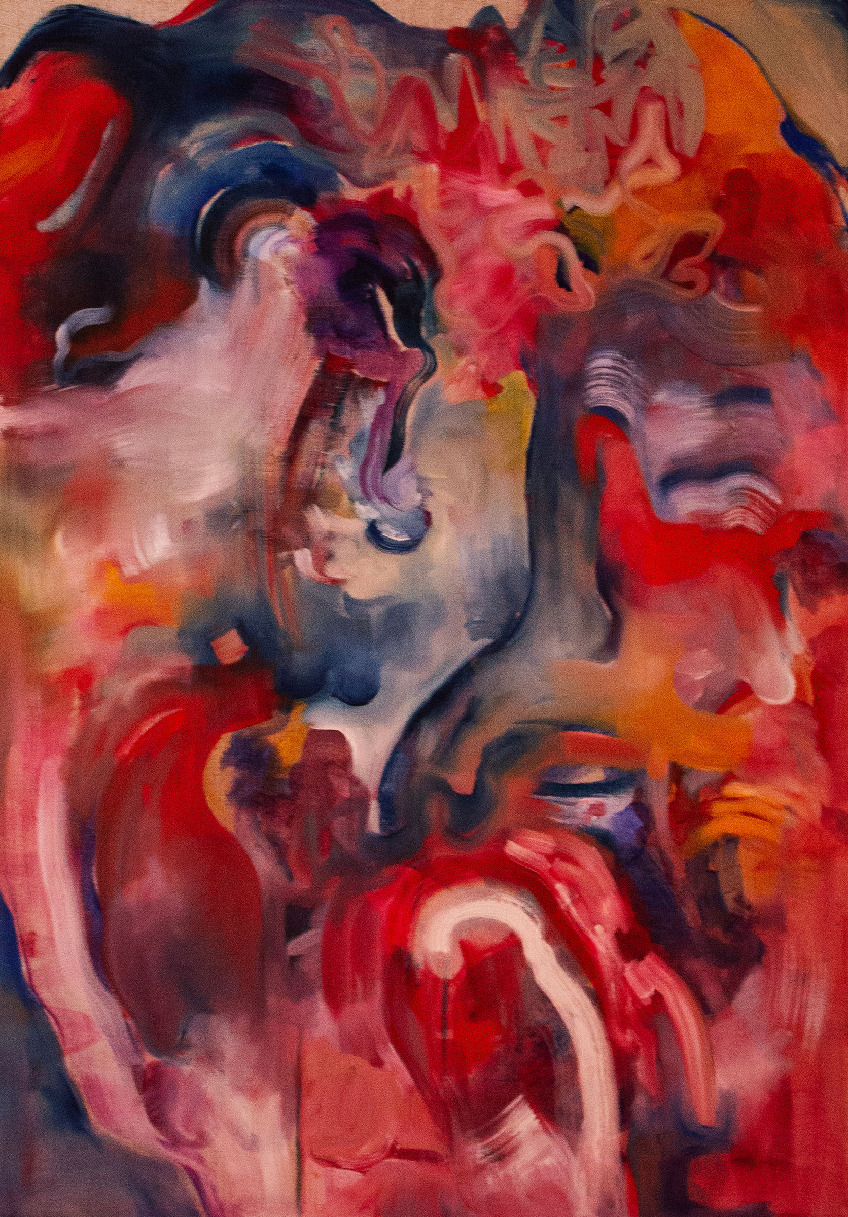 A painting of a woman's face with red and blue paint.