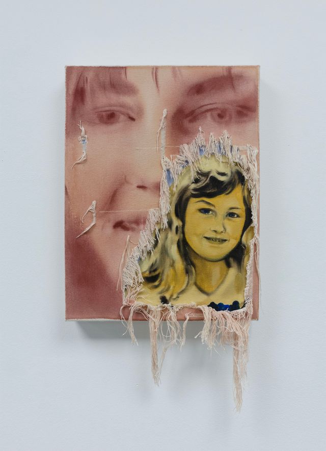 A piece of paper with a picture of a woman's face on it.