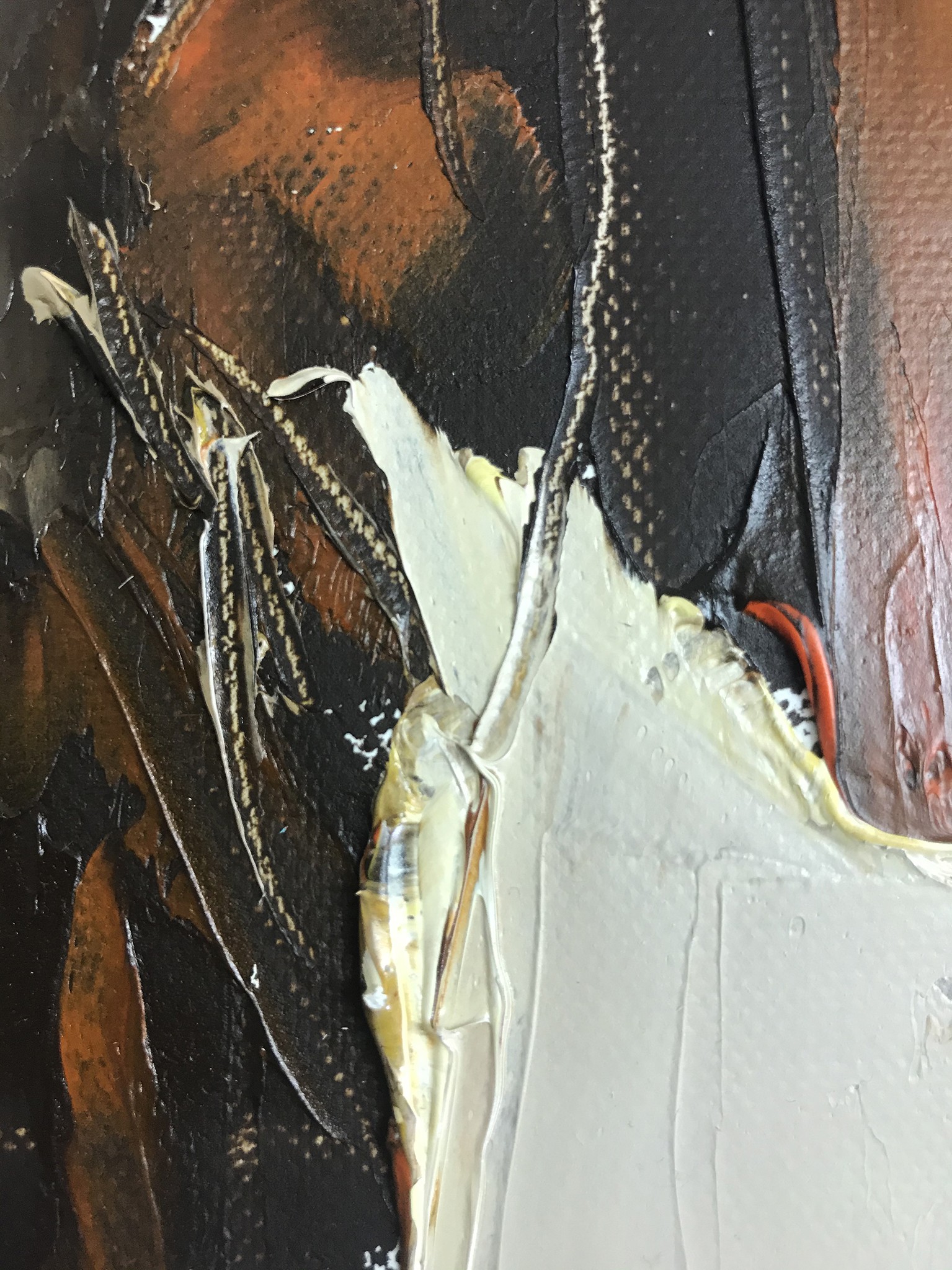 A close up of a painting on a wall.