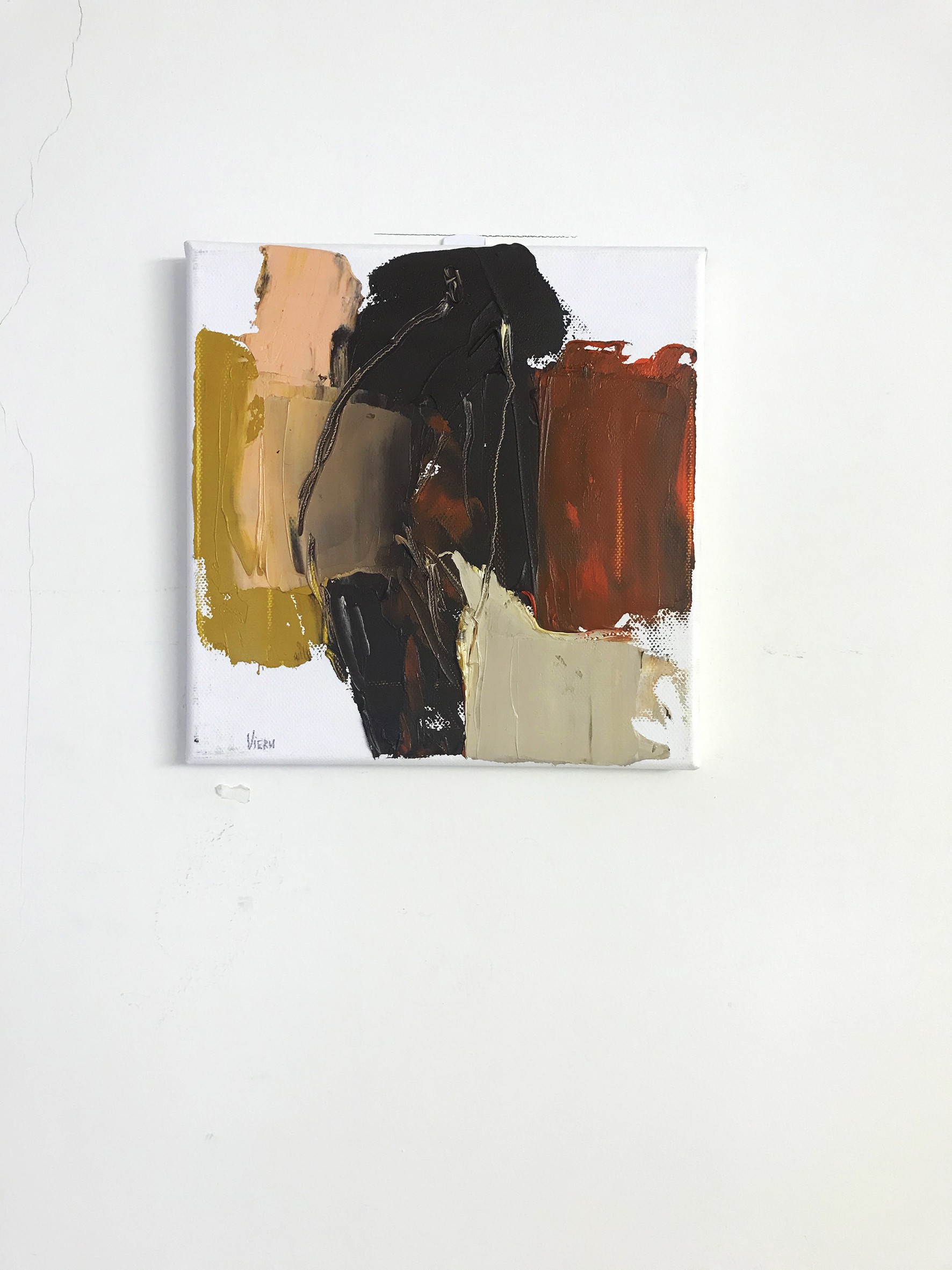 A close up of a painting on a wall.