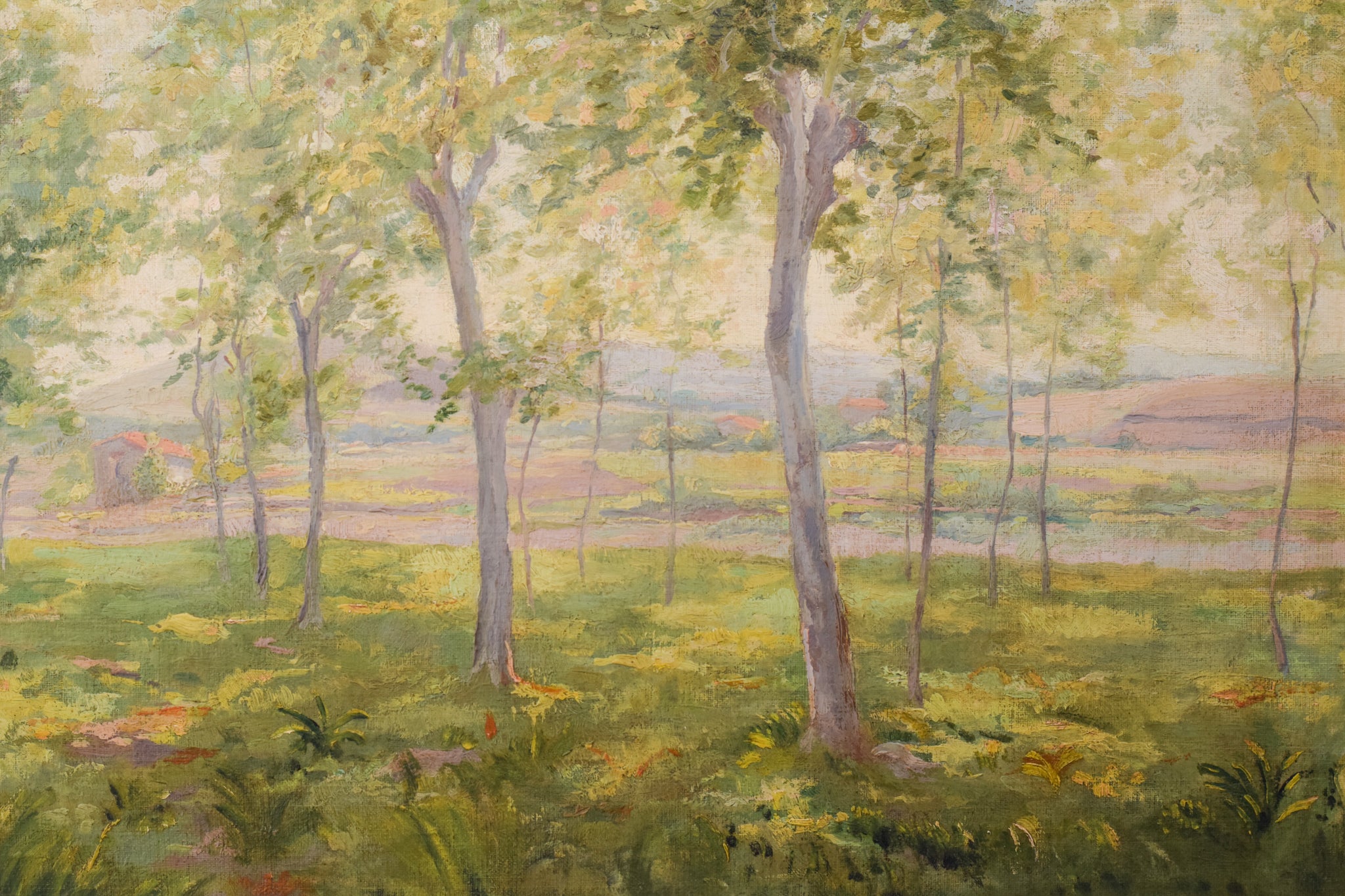 A painting of trees in a grassy field with a house in the background.
