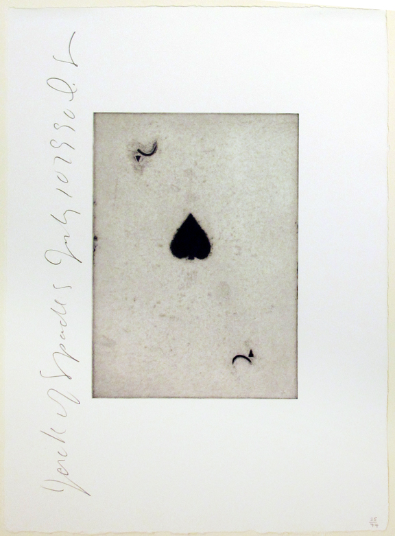 A black and white photo of a playing card.